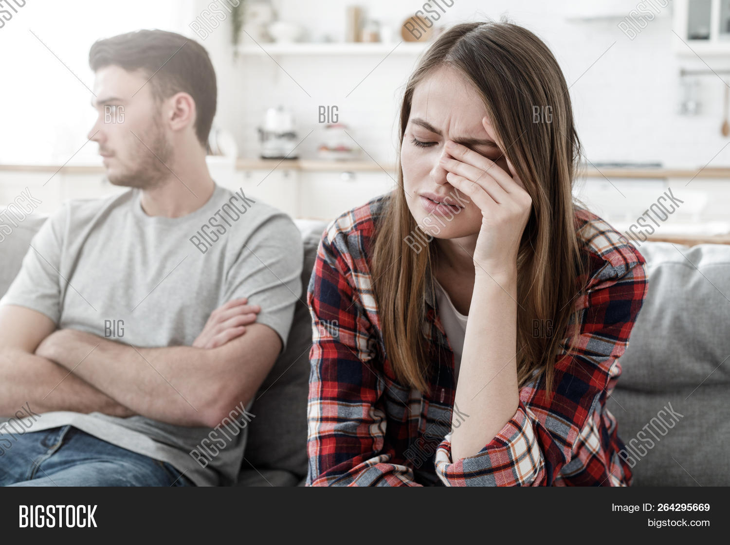 Couple Conflict Stressed Crying Female Sitting On Couch With