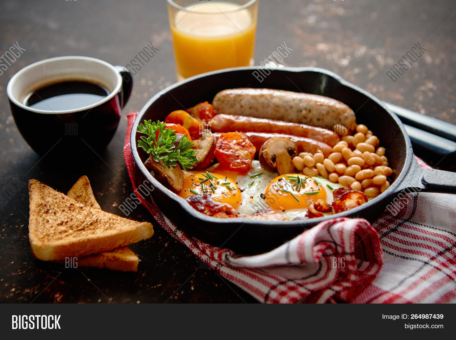 background,bacon,baked,bean,bread,breakfast,butter,cholesterol,closeup,coffee,cooked,cooking,cuisine,delicious,dinner,dish,egg,eggs,english,fat,flat lay,food,fork,fresh,freshness,fried,fried egg,frying pan,full,healthy,knife,meal,meat,morning,mushroom,orange,pan,plate,roasted,sausage,serving size,stone,table,toast,tomato,top,traditional,view,wooden,yolk