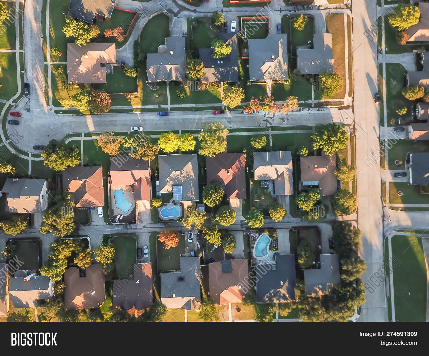 above,aerial,america,attached,autumn,backyard,building,carrollton,colorful,community,cul-de-sac,development,driveway,drone,dwelling,exterior,fall,family,flyover,garage,garden,green,home,house,housing,leisure,living,luxury,neighborhood,outdoor,overhead,park,pool,recreation,relax,residence,residential,rooftop,row,seasonal,single,states,street,suburb,surburb,swimming,texas,top,town,united