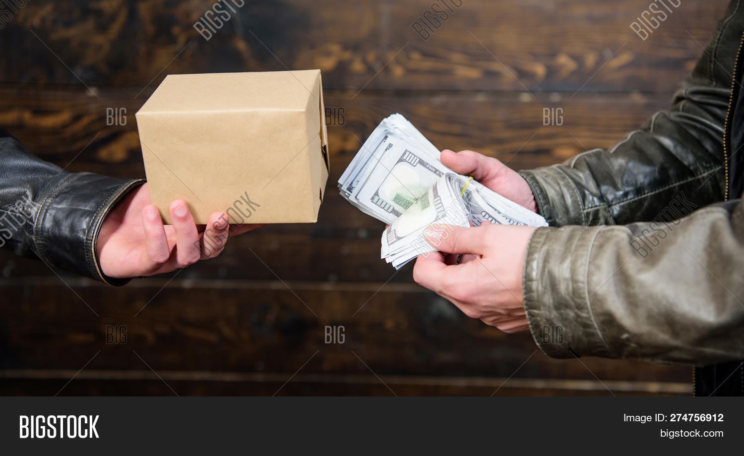 bank,banknotes,box,break,bribe,buy,buyer,cash,concept,crime,criminal,currency,deal,dealer,dollar,drugs,earn,exchange,financial,forbidden,goods,hand,illegal,investing,investment,item,law,lawless,man,money,package,products,profit,safe,safety,save,savings,secret,spy,success,transaction,trust,unlawful,wellbeing,wrongful