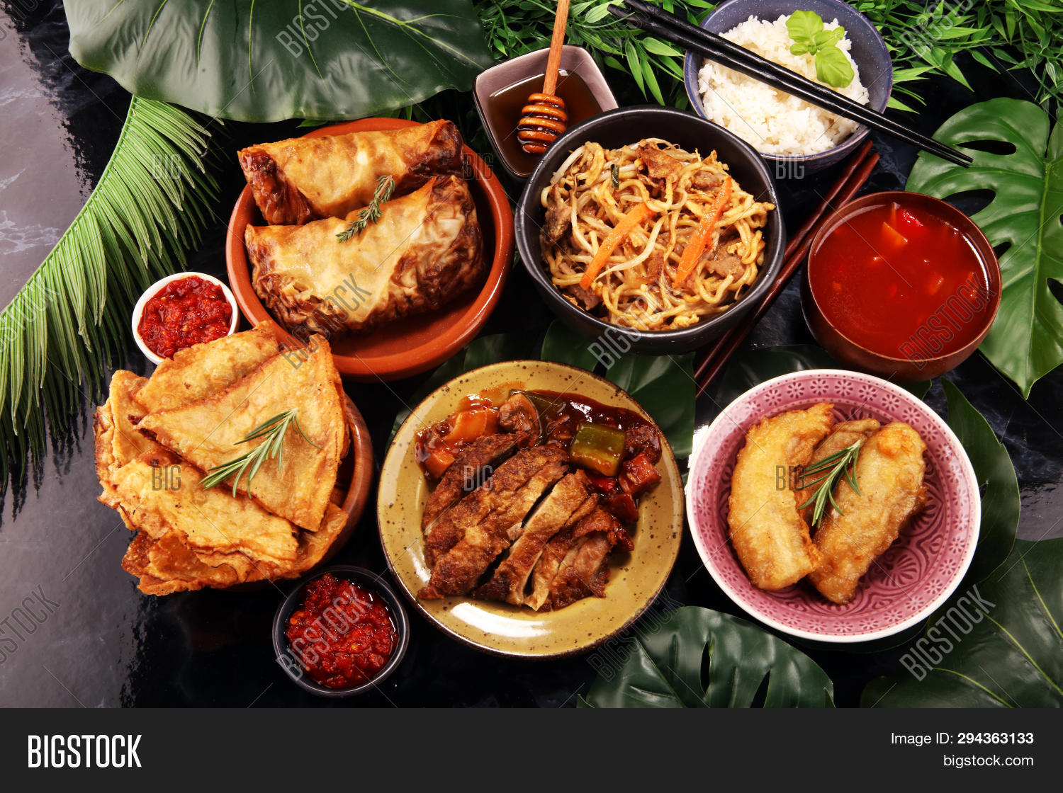 above,asian,assorted,background,bowl,chicken,china,chinese,chopsticks,cuisine,dark,dim,dinner,dish,duck,dumpling,food,fried,fry,meat,noodles,oriental,party,plate,restaurant,rice,roll,set,spring,steamed,stir,sum,table,thai,vegetable,wok