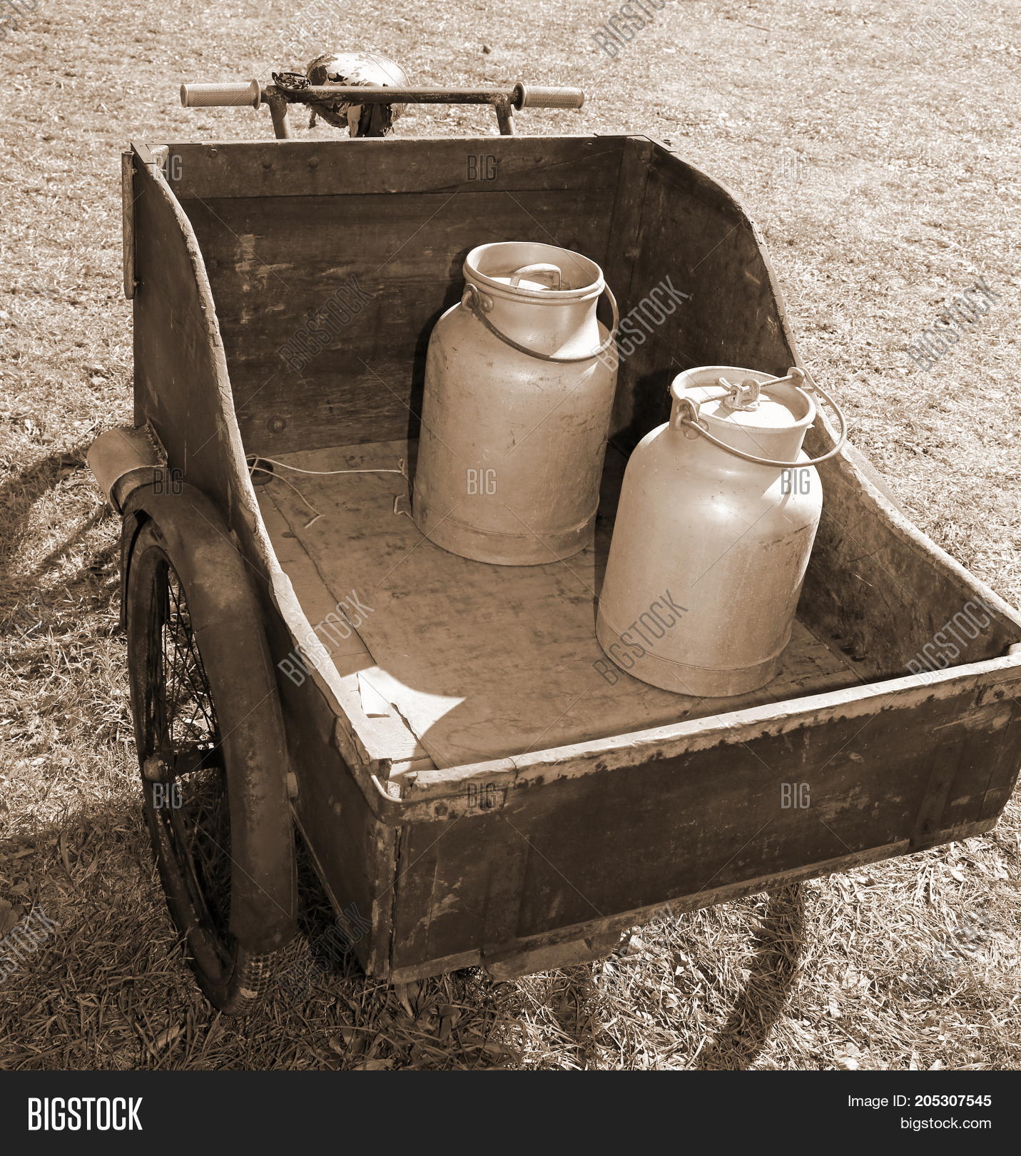 1920s,1930s,agriculture,aluminium,aluminum,ancient,antique,beverage,bicycle,bike,bin,bottle,can,canister,carry,cart,container,countryside,dairy,delivery,drink,equipment,farm,farming,food,grunge,milk,milked,nostalgia,old,sepia,wagon,wood,wooden