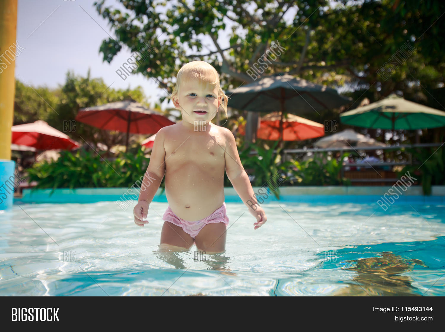 active,azure,bath,beautiful,blonde,blue,caucasian,child,closeup,colourful,cute,daughter,exotic,face,girl,gleam,happy,healthy,hotel,joy,kid,little,nature,parasol,photo,plant,play,pool,pretty,shade,shallow,small,smile,splash,stand,swim,swimming,swimsuit,toddler,toutism,transparent,travel,tropic,tropical,turquoise,water
