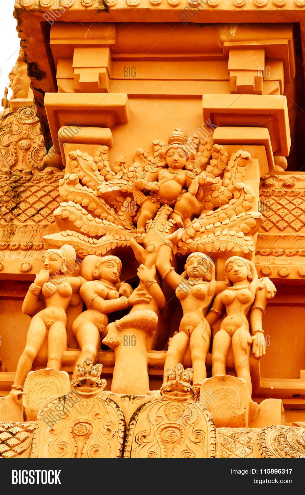 architecture,brihadeeswarar,climbing,cow-herd,depicted,garments,girls,gopi,krishna,krishna-leela,lord,milk-maids,naughty,playing,stealing,temple,thanjavur,their,tree,unmarried,village