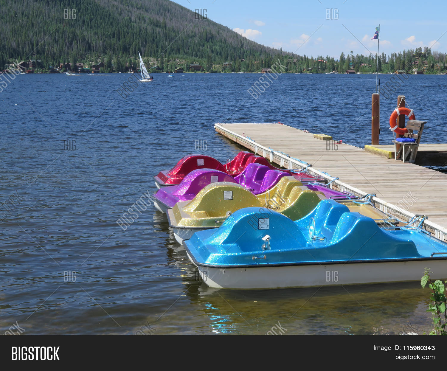 activity,adventure,boat,boating,colorado,colorful,docks,exercise,flowers,fun,granby,lake,leisure,lupine,paddle,pedal,shore,sparkle,summer,sun,travel,vacation,water,wildflowers