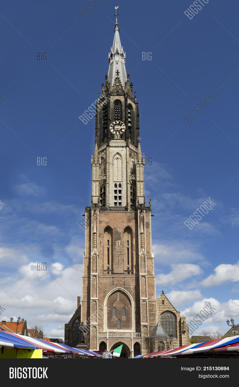 architecture,beautiful,bell,blue,building,cathedral,church,city,cityscape,colorful,day,delft,dutch,editorial,europe,facade,heritage,historic,historical,holland,kerk,landmark,life,market,netherlands,new,nieuwe,old,outdoors,people,square,summer,sunset,tall,tourism,tower,town,traditional,travel
