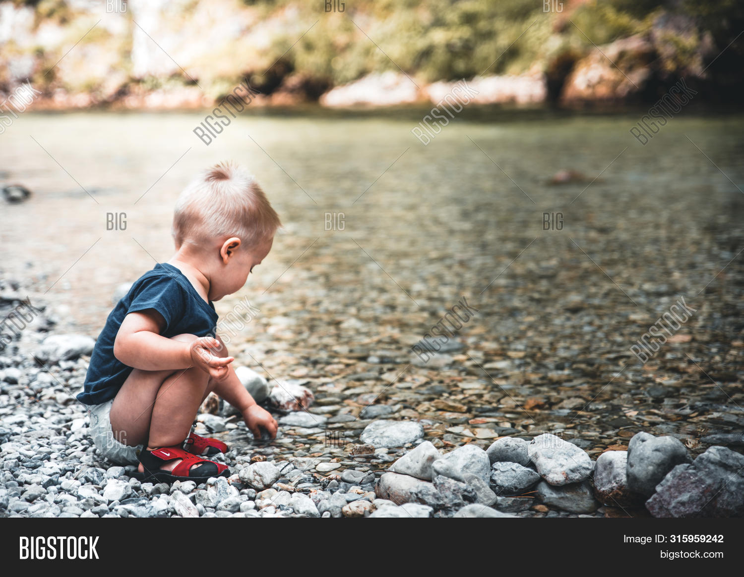 activity,alone,attentive,baby,background,beautiful,blue,boy,child,childcare,childhood,concentrated,cute,enjoying,happy,isolated,kid,lake,leisure,lifestyle,little,lone,loneliness,lonely,nature,outdoor,outside,overcast,person,play,playing,pond,river,serious,sitting,solitary,solitude,stones,summer,thinking,thoughtful,toddler,travel,water,young