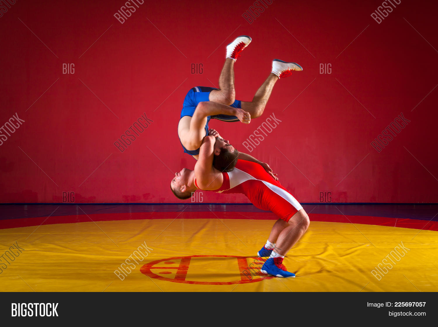 above,action,adult,amateur,athlete,athletic,background,black,blue,caucasian,competition,exercise,fight,fit,folkstyle,freestyle,game,grapple,grappling,greco,greco-roman,health,isolated,male,man,mat,match,men,people,person,red,roman,shot,singlet,sports,stance,studio,top,training,two,uniform,view,white,wrestle,wrestlers,wrestling,young,youth