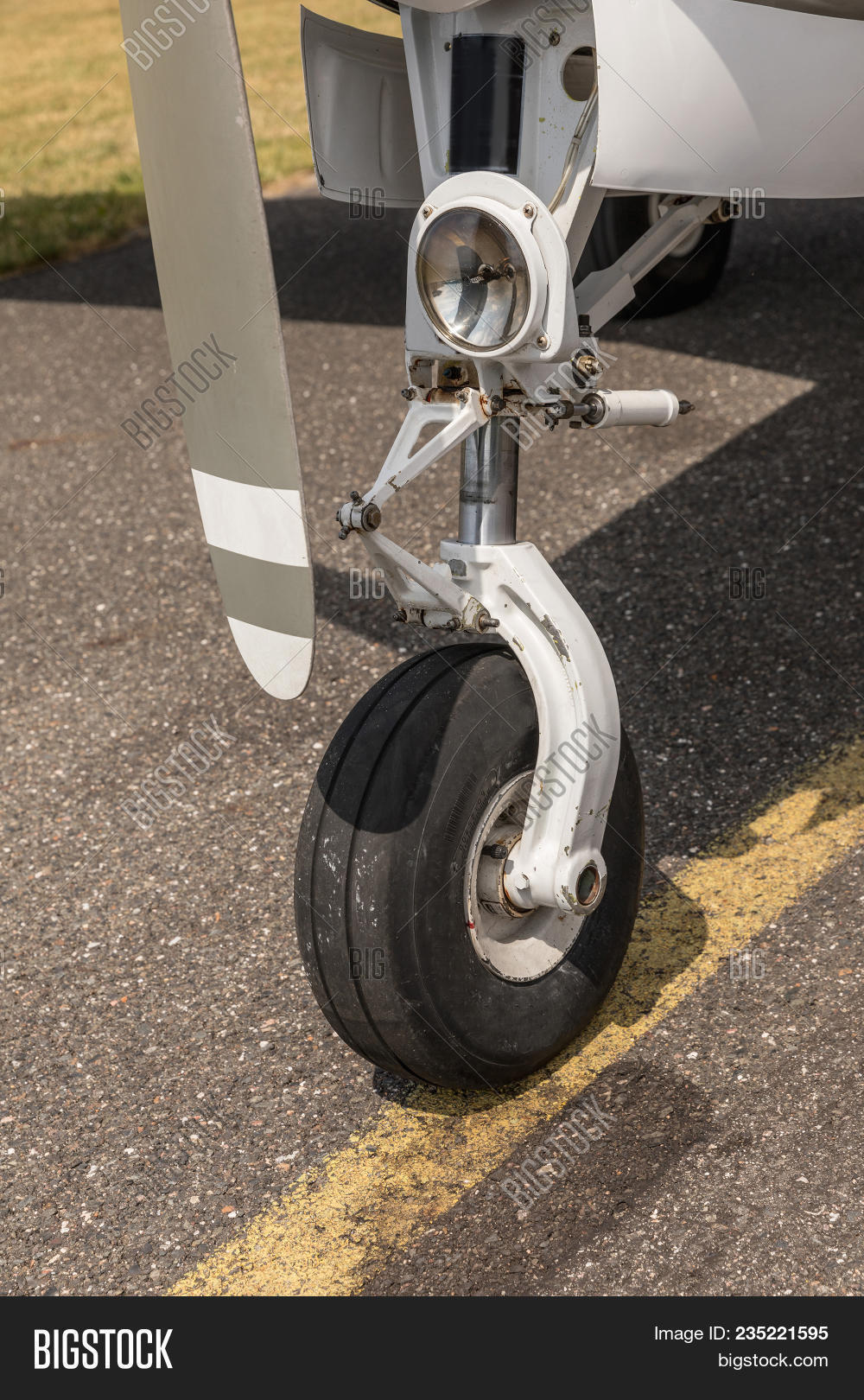 aerospace,air,airbus,aircraft,airplane,airport,aviation,below,bow,business,close,construction,departure,engine,flight,fly,front,gear,ground,isolated,jet,landing,machine,part,plane,power,runway,speed,technology,tire,transport,transportation,travel,tyre,vacation,vehicle,wheel,white