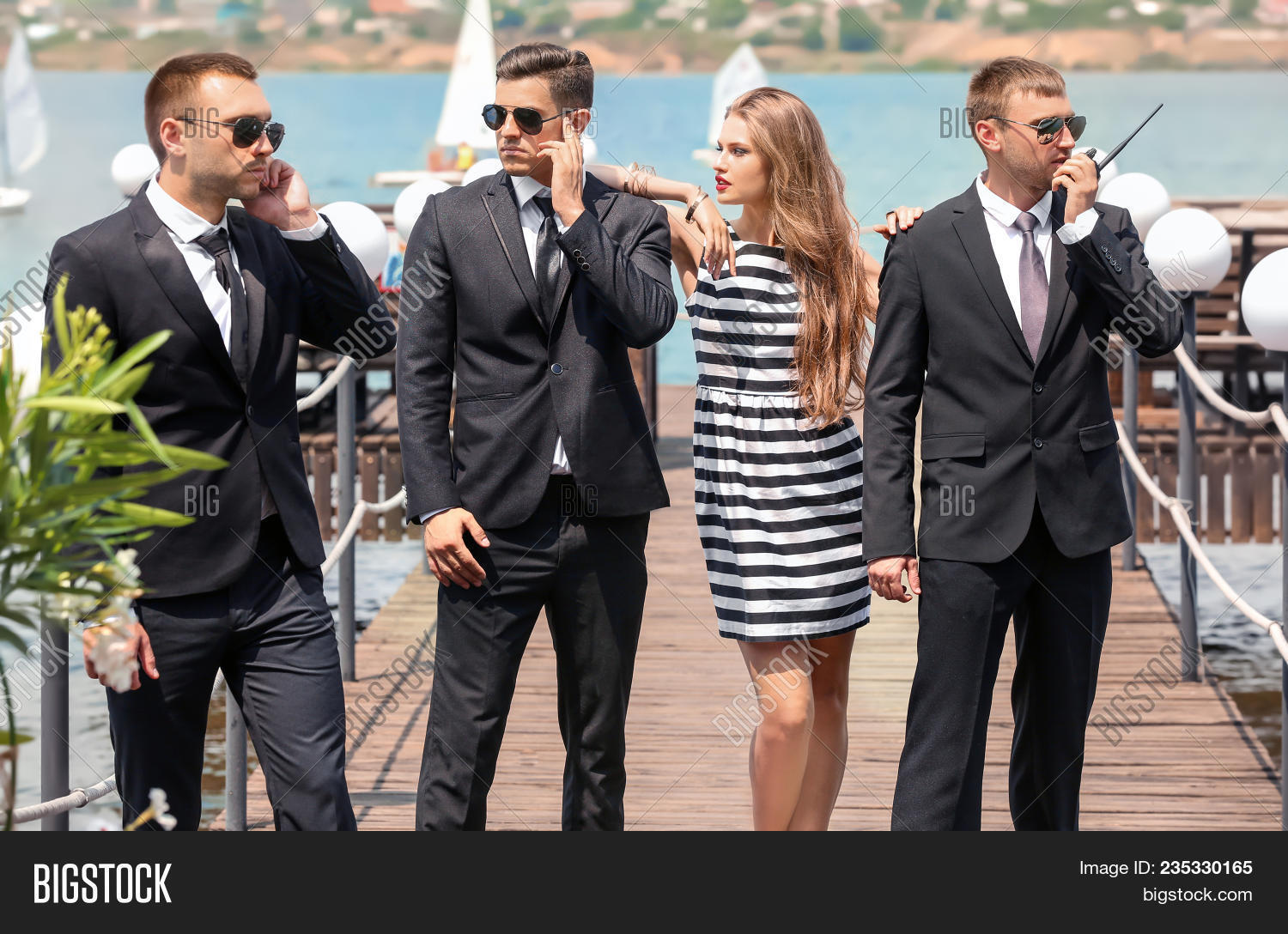 actress,agent,background,bank,beautiful,bodyguard,bodyguards,businesswoman,caucasian,celebrity,city,control,danger,defense,duty,famous,female,formal suit,glamorous,guard,lady,lifestyle,luxury,male,man,men,modern,movie star,outdoors,people,prevention,private,profession,professional,protection,river,safe,safety,security,service,singer,street,sunglasses,supervision,surveillance,urban,watching,woman,work,young