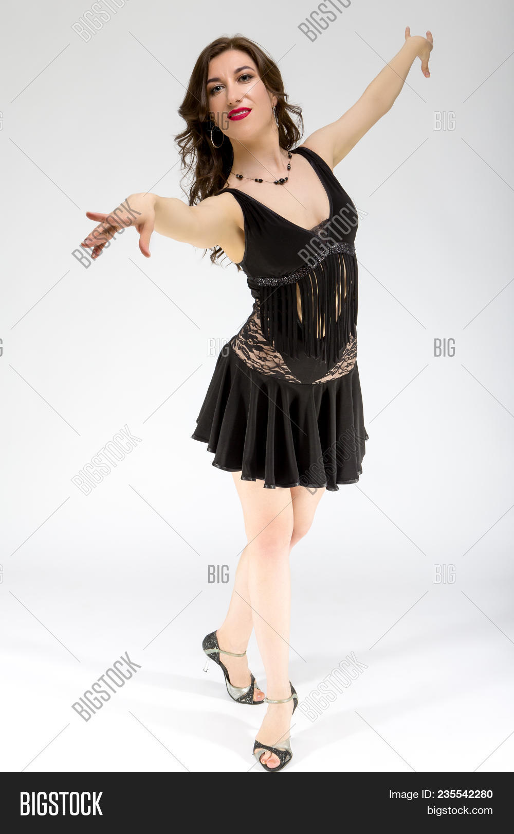 25-35,adult,against,ballroom,black,brunette,caucasian,cha-cha,dance,dancer,dancesport,demure,dress,entice,jive,latin-american,one,pasadoble,passionate,pose,posing,positive,professional,program,quickstep,rumba,samba,seduce,separate,sexuality,sexy,slowfox,sport,tango,thirties,twenties,waltz,white,woman,years