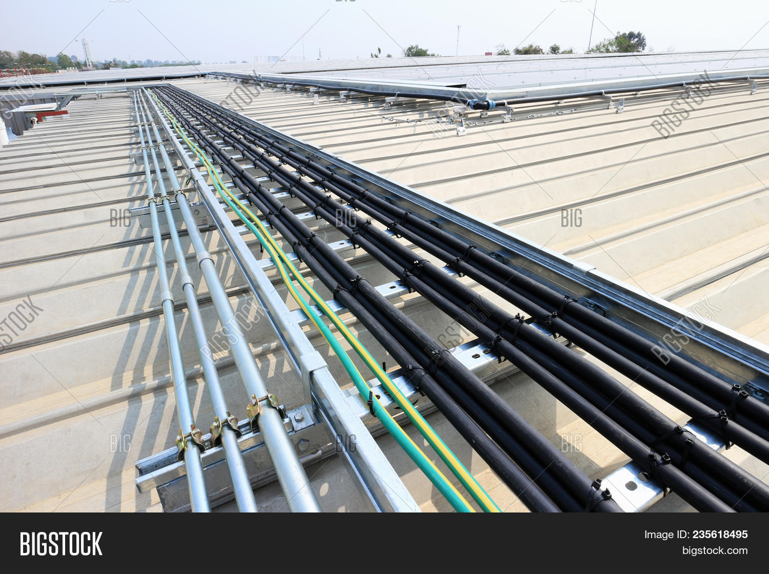 Cable Installation For Solar Rooftop System On Metal Sheet Roof image