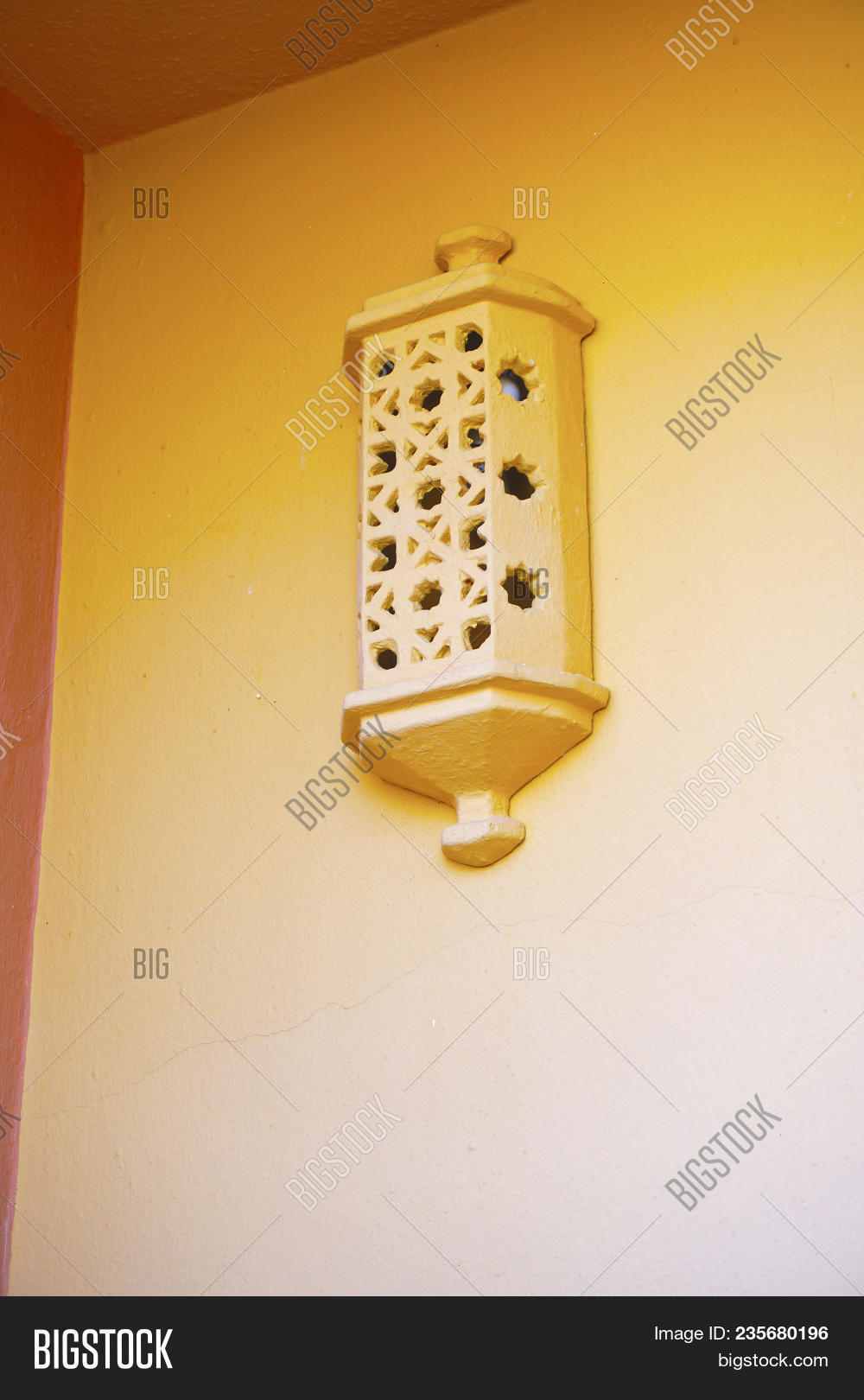 architecture,beige,clay,concrete,historic,lighting,peach,sconce,wall