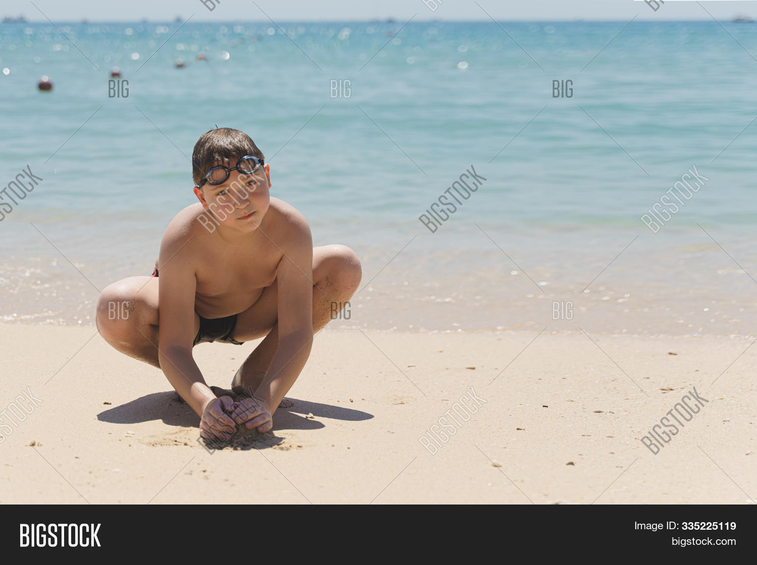 action,activity,art,barefoot,beach,boy,building,castle,cheerful,child,childhood,coast,creative,desolate,evening,figures,fun,hands,hobby,hole,inside,island,joy,kid,legs,leisure,lifestyle,little,man,nature,ocean,outdoor,people,person,play,playful,portrait,resort,sand,sculpt,sculpting,sea,shore,sitting,summer,topless,tropical,vacation,water