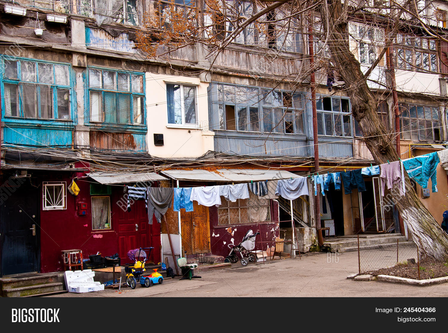 Odessa,Ukraine,ancient,architecture,authentic,brick,building,city,clothesline,concrete,construction,corridor,courtyard,drying,entrance,exterior,facade,grunge,home,house,laundry,old,porch,retro,roof,rust,rusty,stairs,stone,street,structure,town,traditional,travel,tunnel,urban,vintage,wall,weathered,white,window,wreck