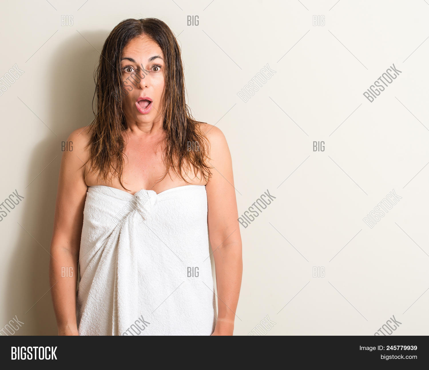 afraid,amazed,amazement,amazing,astonish,bath,bathroom,care,clean,conditioner,disbelief,emotion,excited,expression,eyes,face,fashion,fear,female,funny,hair,happiness,happy,hispanic,long,mature,middle age,mouth,nervous,open,sad,scared,senior,shock,shocked,shower,spa,surprise,surprised,towel,treatment,washing,wellness,wet,woman,wonder,worried,wow