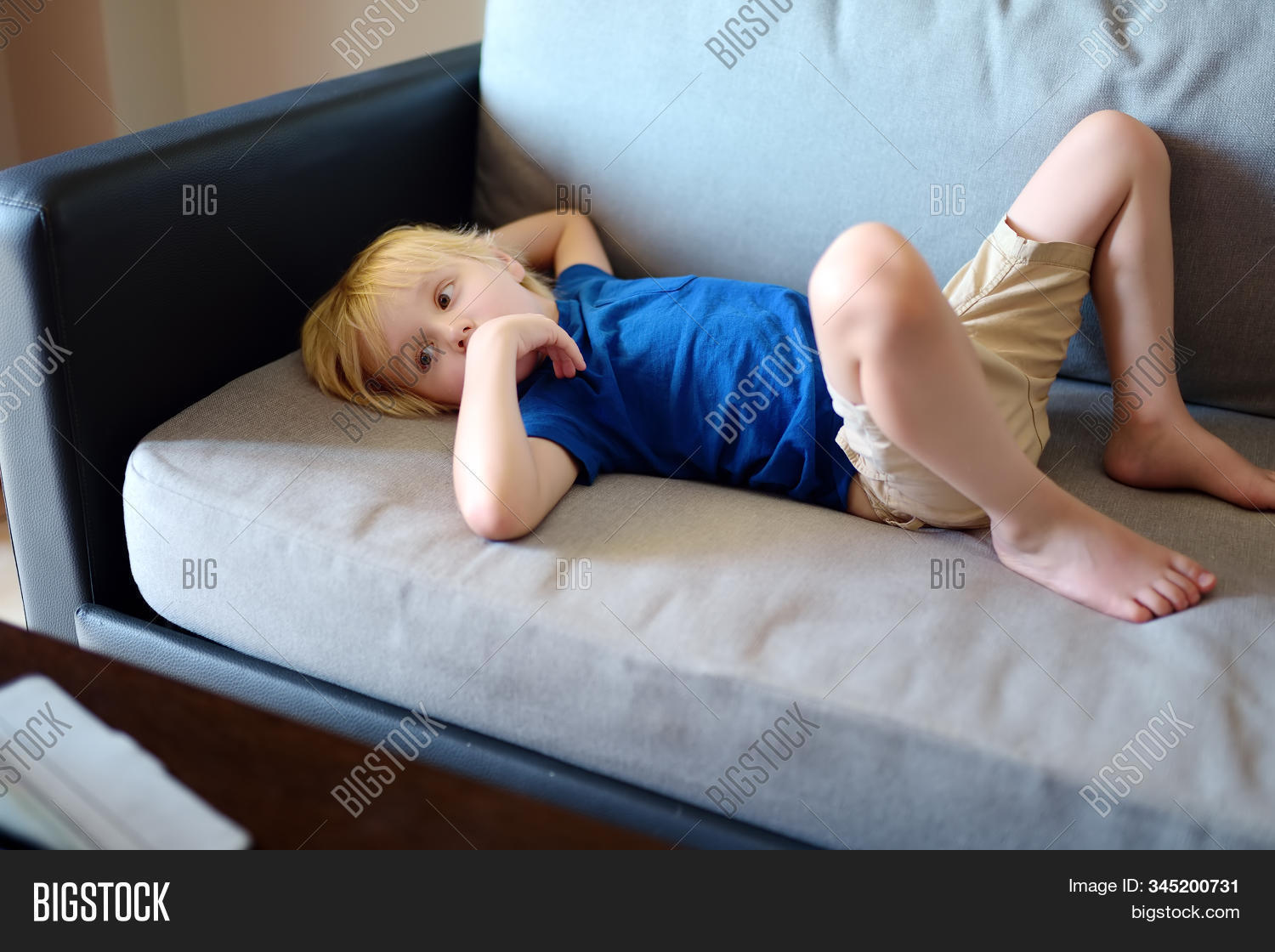 boy,gadget,watching,cartoons,movie,addiction,gadget-addicted,tablet,pc,pad,Internet,advertising,computer,preschooler,clips,watch,mobile,baby,little,people,dependence,dependability,dependable,digital,emotion,fun,looking,one,person,technology,modern,caucasian,blond,blue,t-shirt,laing,child,kid,male,day,attractive,children,childhood,home,indoors,problem,video,young