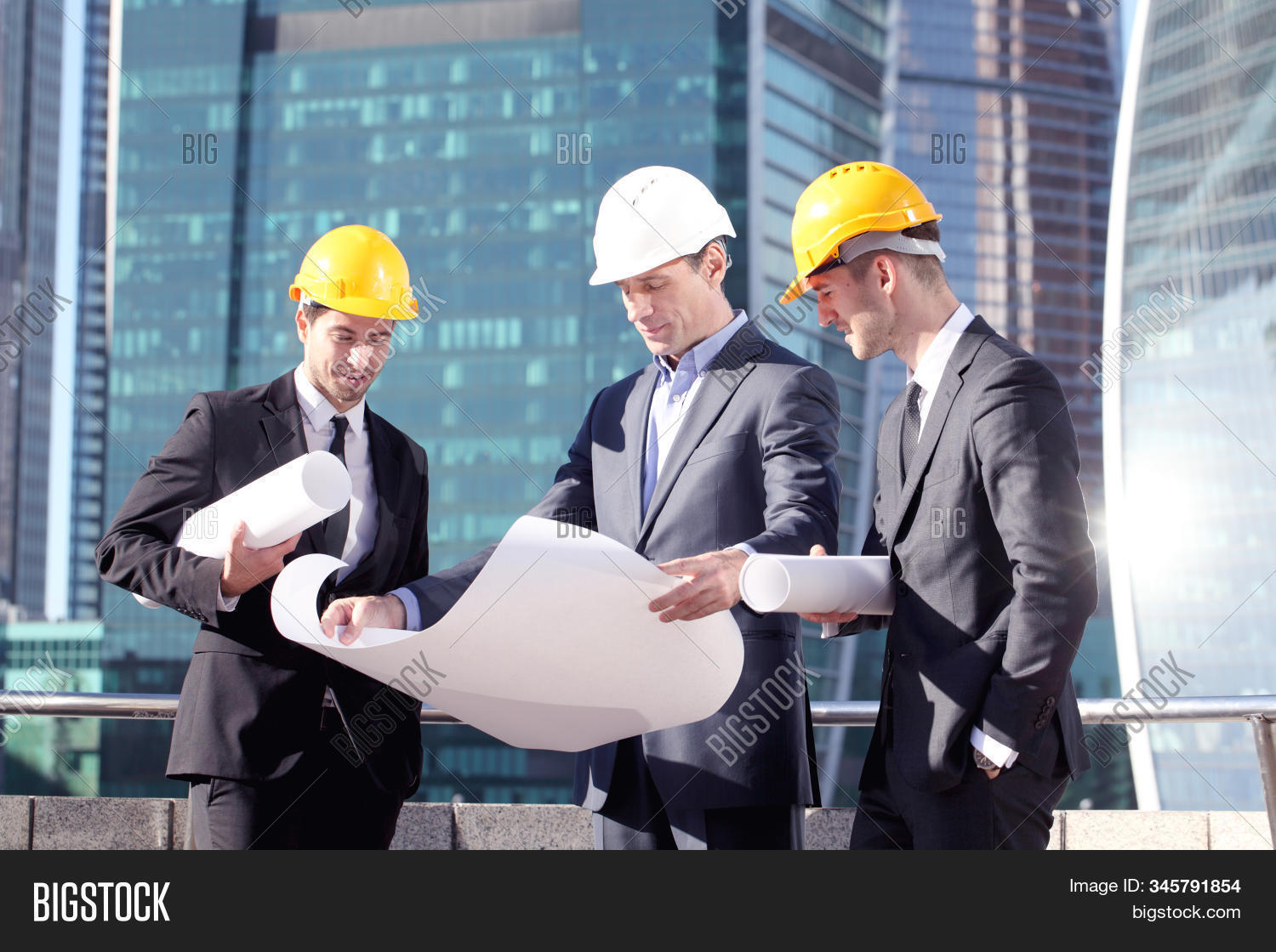 architect,business,construction,industry,plan,helmet,people,skyscraper,men,engineer,architecture,manager,male,businessman,work,adult,job,site,project,worker,supervisor,teamwork,occupation,professional,builder,group,foreman,meeting,team,pointing,blueprint,designer,build,city,man,partnership,modern,industrial,engineering,contractor,innovation,company,working,development,talking,discussing,look,investors