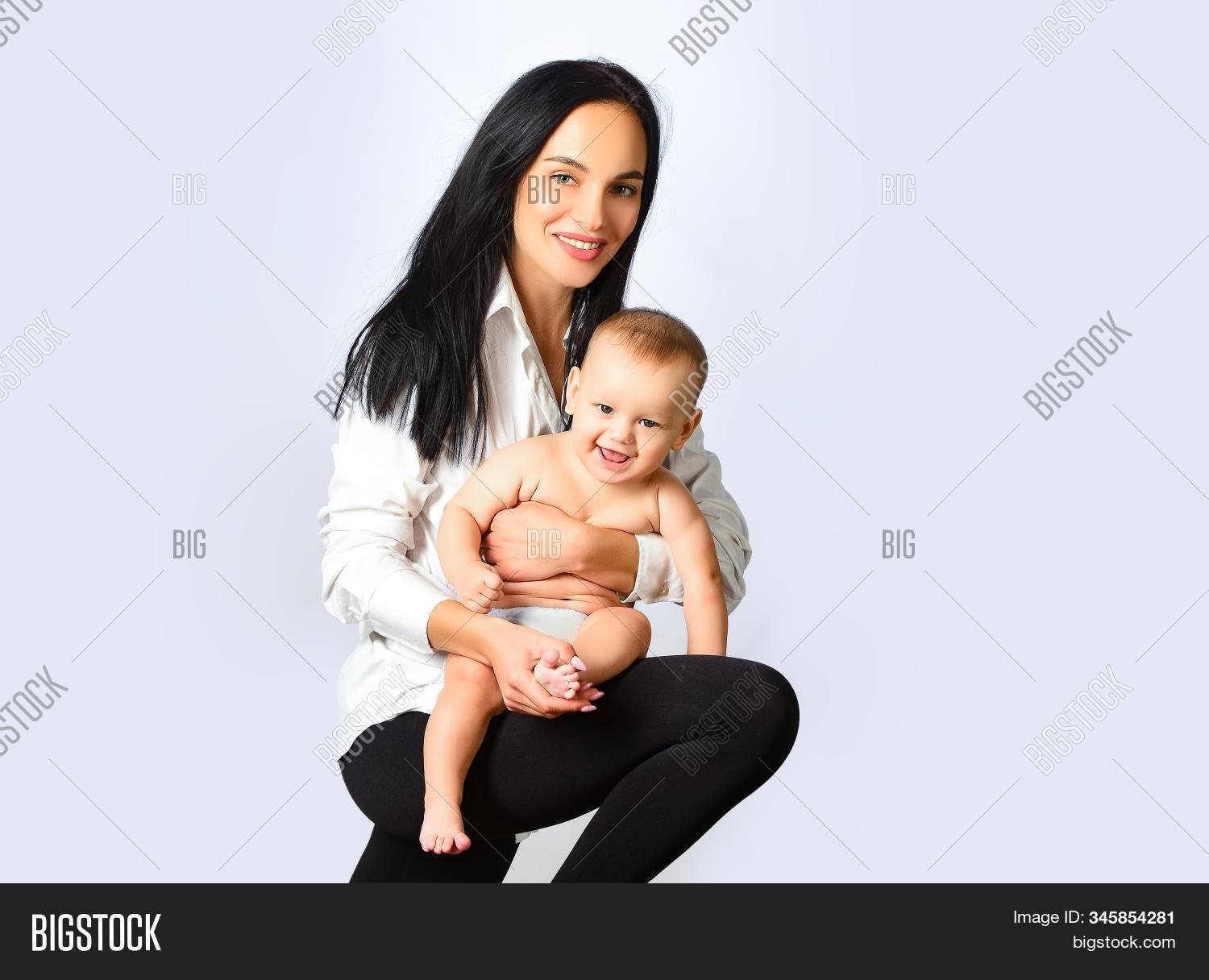 smiling,decree,femininity,healthy,childcare,beautiful,pretty,motherhood,hold,joy,hug,person,human,lady,offspring,cheerful,love,beauty,infant,trendy,care,parent,happy,mom,woman,female,mother,smile,baby,people,kid,child,attractive,women,sensual,lovely,mama,parenting,kiss,safety,touch,childhood,tenderness,charming,studio,real,funny,positivity,newborn,shot