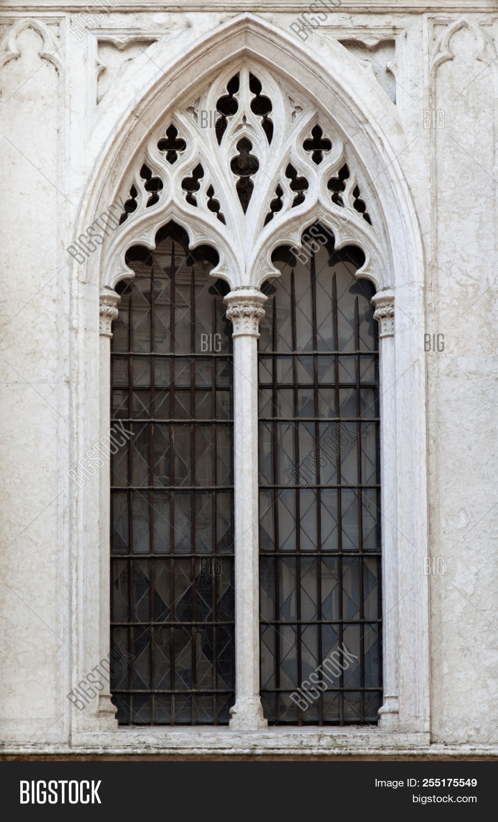 arch,arched,architectural,architecture,blue,brick,casement,cathedral,catholicism,christianity,church,decorative,detail,frame,glass,gothic,lancet,long,medieval,mullion,nobody,ogival,ogived,old,ornamental,outdoors,religion,sash,speary,style,tall,vertical,window
