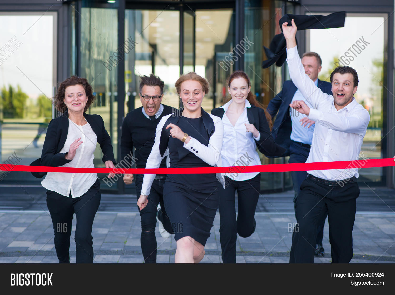 aim,aspiration,building,business,businessman,career,catch,chase,competition,complete,concept,corporate,determination,determined,end,executive,female,finish,happy,leader,leadership,line,male,man,motivation,office,people,person,prize,purpose,race,rat,rat-race,red,reward,ribbon,run,running,success,suit,tape,target,team,win,winner,woman,worker