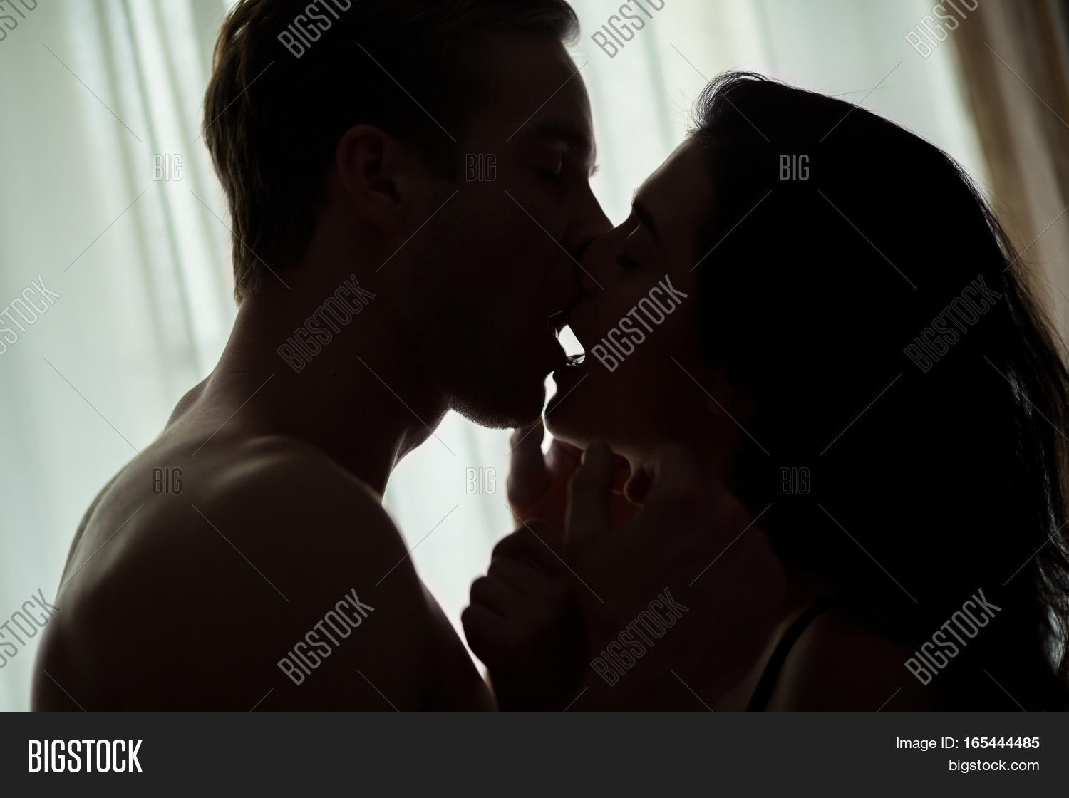couple,kiss,dark,indoor,passion,heat,man,woman,love,desire,male,sensual,female,young,sexy,romance,sex,two,passionate,relationship,together,beautiful,beauty,intimate,girl,people,romantic,erotic,boyfriend,girlfriend,lover,satisfaction,home,room,guy,background,hormone,feeling,window,silhouette,crazy,priceless,light,date,affection,sense,closed,eye,touch,tender