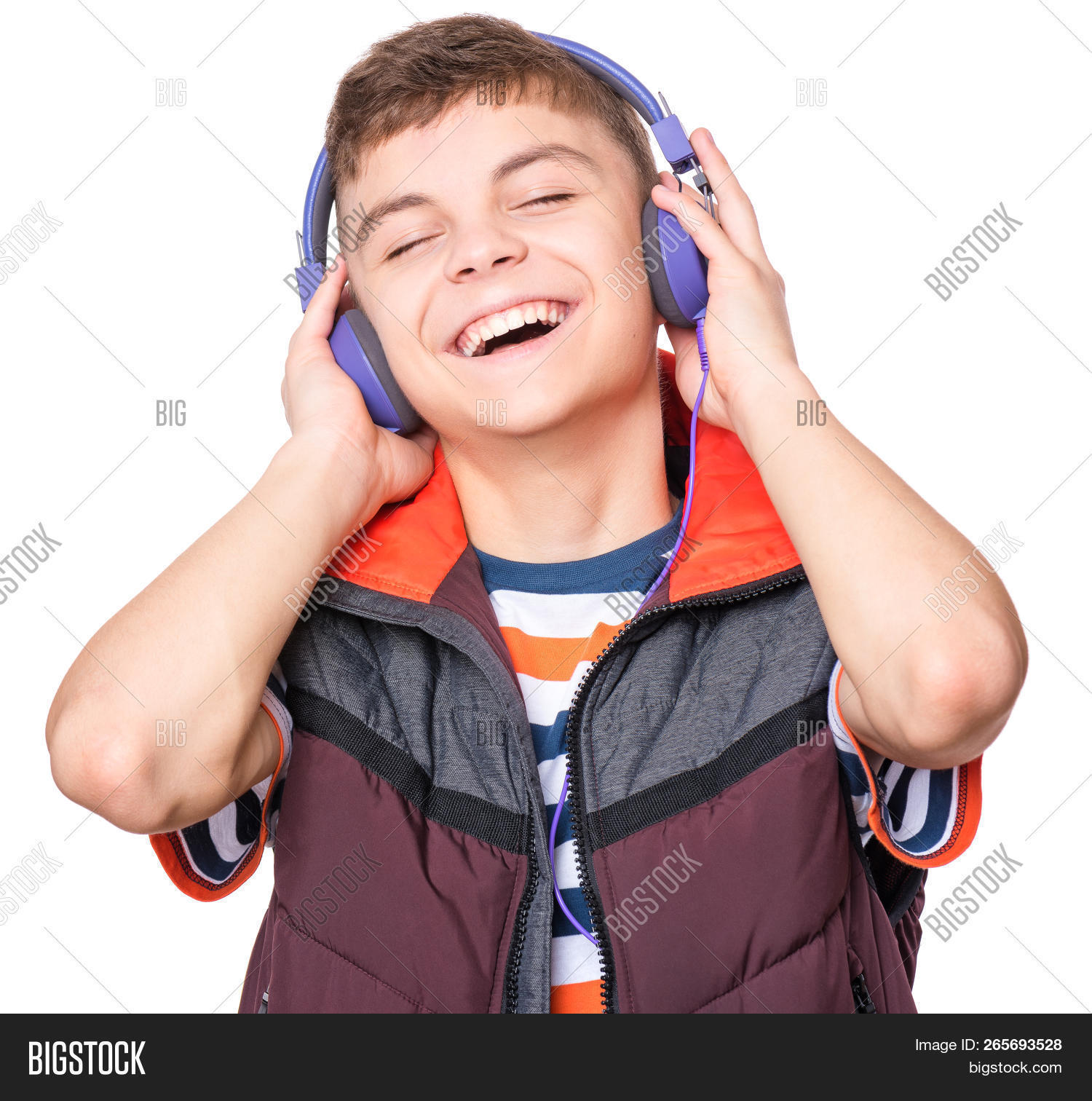 adolescence,adolescent,alone,boy,child,childhood,earphones,emotional,entertainment,expression,eyes,face,fun,generation,guy,handsome,happy,headphones,headshot,isolated,kid,leisure,listen,male,man,modern,mp3,music,person,portrait,pre-teen,radio,rock,sing,singer,smile,song,sounds,stereo,student,style,technology,teenage,teenager,trendy,tune,wearing,young,youth