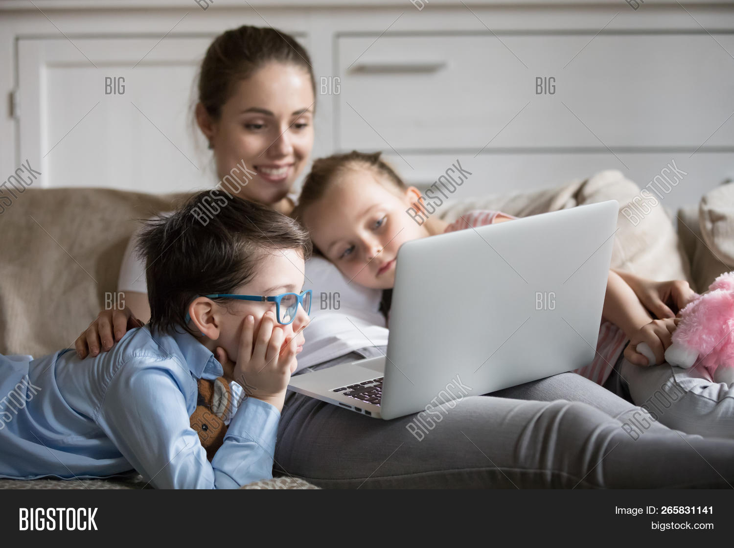 affectionate,app,application,bonding,boy,browsing,care,children,comfort,communicate,computer,connection,couch,daughter,device,family,fun,gadget,good,happy,home,internet,kids,laptop,lazy,little,looking,love,mom,mother,motherhood,offspring,online,parent,people,relationships,relaxing,rest,smiling,software,son,surfing,tech,technology,together,upbringing,use,video,watch,woman