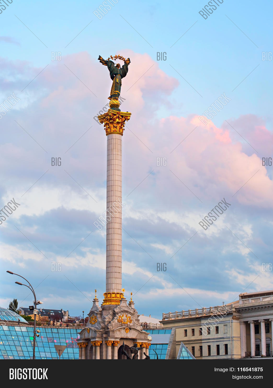 architecture,attraction,beautiful,berehynia,blue,building,center,city,color,colorful,column,dusk,europe,european,famous,female,flag,front,gold,hotel,image,independence,kiev,kyiv,landmark,maidan,monument,nezalezhnosti,nobody,outdoor,people,sightseeing,sky,square,statue,street,sunset,symbol,tourism,tourist,twilight,ukraine,ukrainian,urban,vertical,view,woman