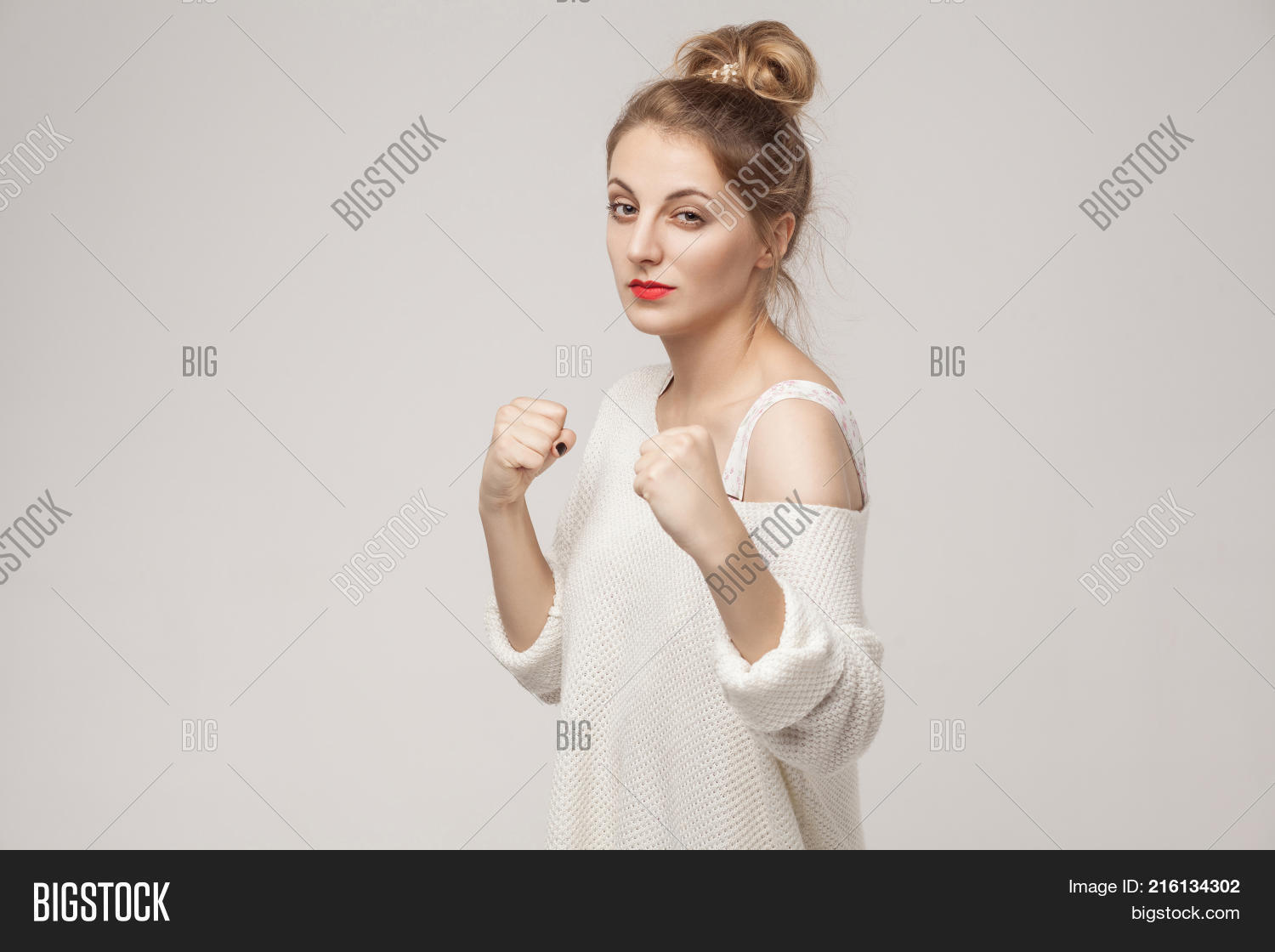 🔥 Fight And Dangerous Concept Aggressive Blonde Woman Standing In Boxer Pose 216134302 Image