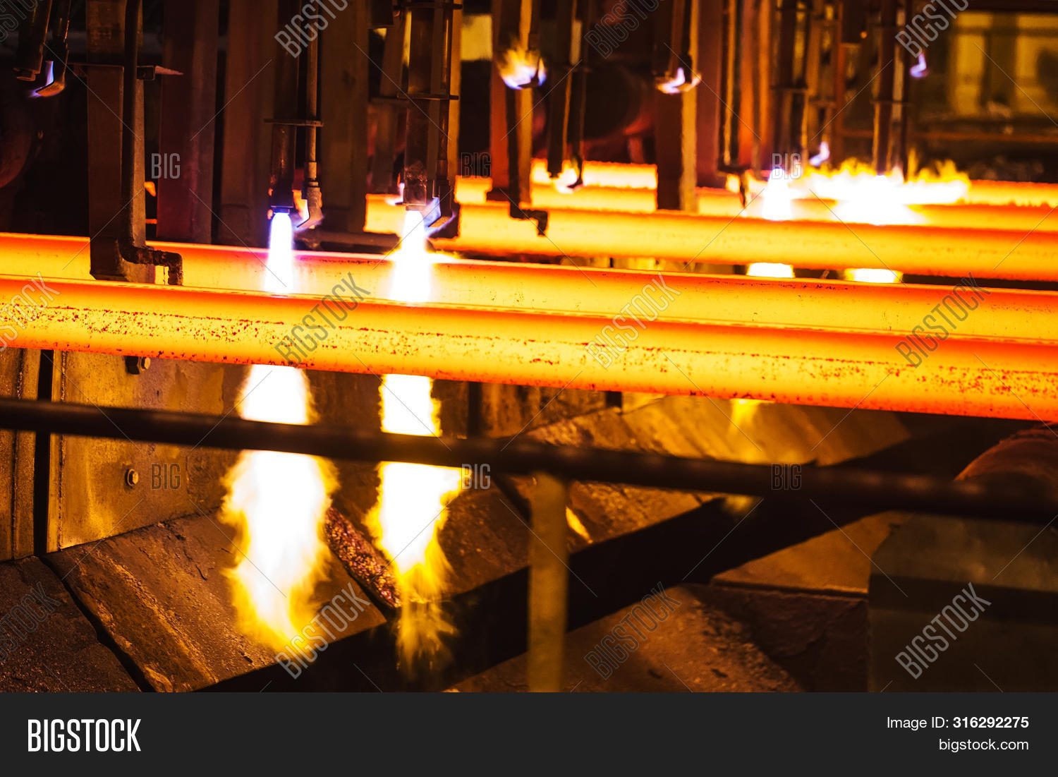 beam,billet,bloom,bright,building,casting,continuous,cutting,equipment,fabric,factory,fire,flame,foundry,furnace,heat,heavy,hot,industrial,industry,iron,light,liquid,machine,making,manufacturing,melting,metal,metallurgical,metallurgy,mill,molten,orange,plant,production,red,resource,rolling,slab,smoke,spark,sparkles,steel,strand,torch,turret,work,workshop