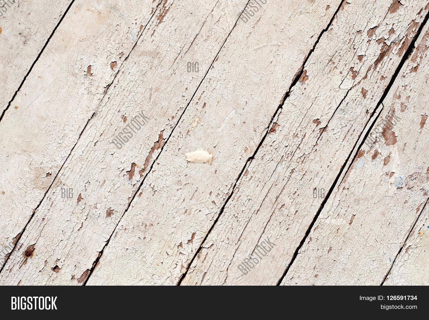 abrasive,background,chipped,close,crusty,delapodated,derelict,detail,exposed,fence,gap,garden,grain,house,line,nail,neglected,old,outdoor,paint,panel,peel,picnic,rough,splinter,table,texture,textured,top,up,vintage,weathered,white,wood,wooden,worn