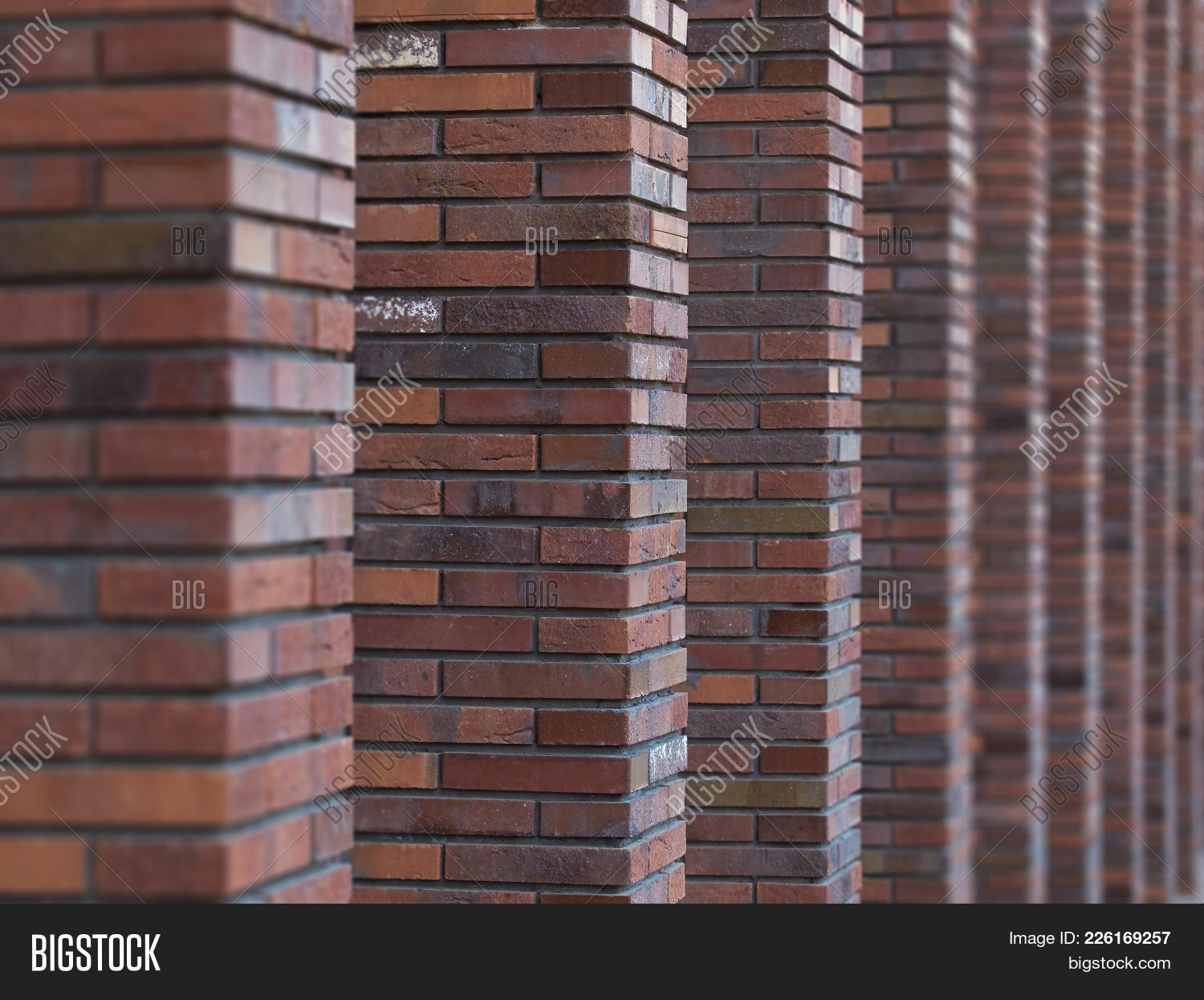 Perspective Diagonal View On Abstract Brown Red Brick Wall With
