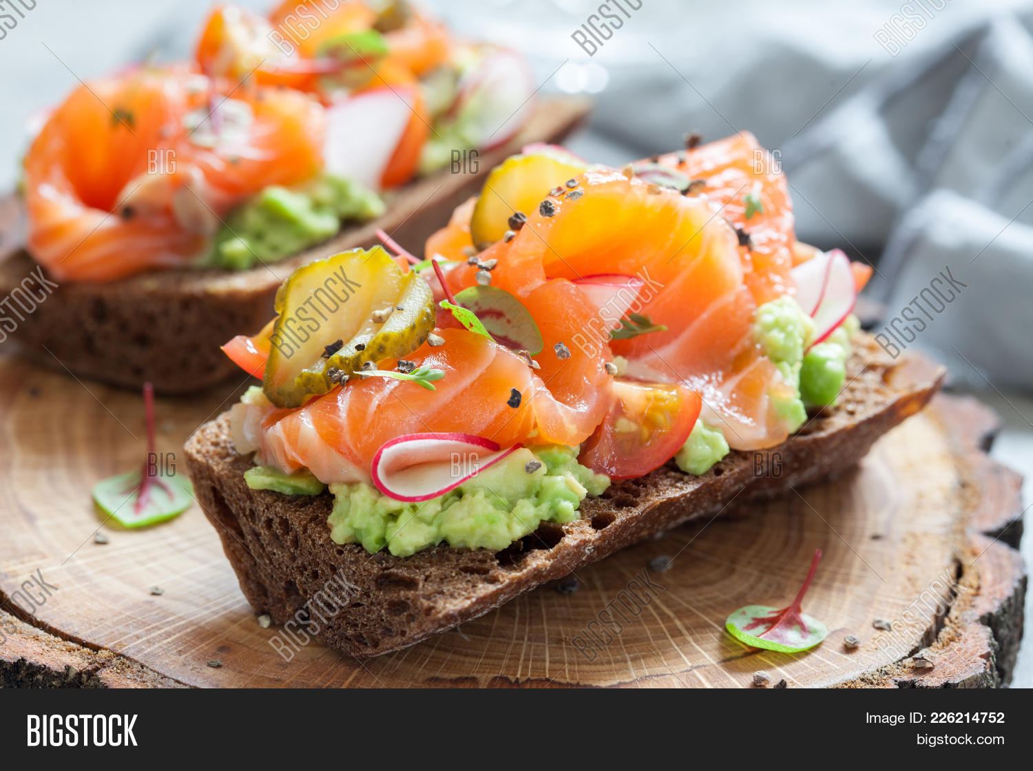 appetizer,avocado,background,bread,breakfast,butter,cheese,cooking,cucumber,cuisine,danish,dinner,eating,fish,food,fresh,gourmet,green,healthy,lunch,meal,natural,nordic,nutrition,onion,pickled,radish,red,restaurant,rye,salmon,sandwich,seafood,smoked,smorrebrod,snack,tasty,tomatoes,variety,vegetable,wooden