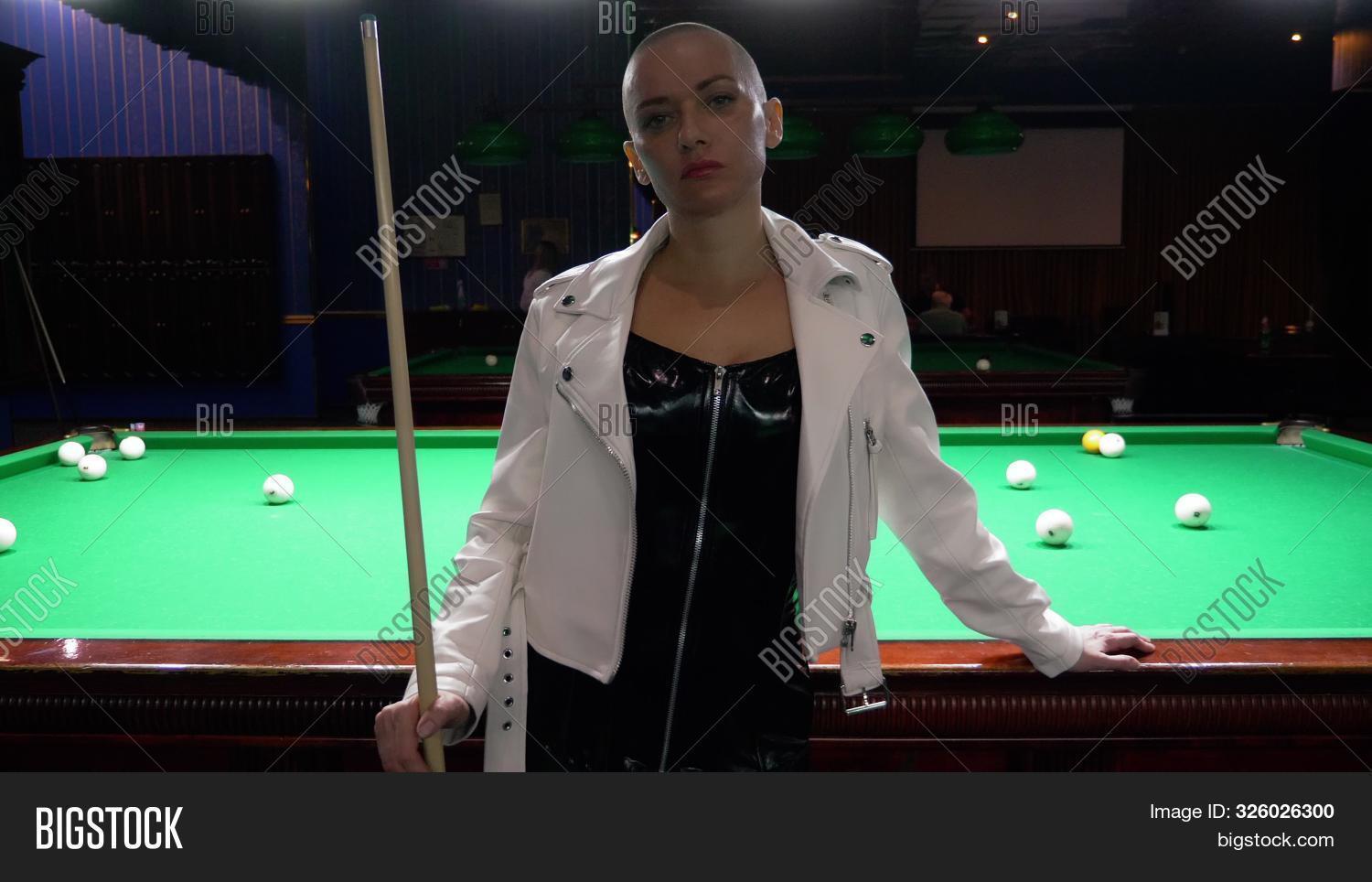 activity,aim,aiming,angle,attractive,bald,ball,bar,beautiful,billiard,caucasian,challenge,cloth,club,compete,cue,fashion,female,feminine,fun,game,girl,hair,hall,leather,leisure,looking,model,modern,nightlife,person,play,playing,pool,portrait,pub,sexy,snooker,sport,stylish,table,woman,women,young