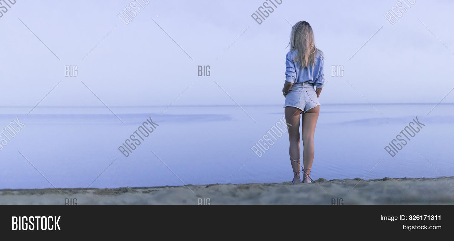 admire,back,beach,beautiful,blonde,booty,calm,calmness,copyspace,denim,equanimity,evening,fashion,fashionable,female,girl,horizon,jeans,lake,legs,model,morning,nature,ocean,outdoors,peace,placidity,quiet,quietude,relax,repose,sand,sea,serenity,sexy,shore,shorts,stands,stillness,tourism,tourist,tranquility,tranquillity,vacation,water,woman,young