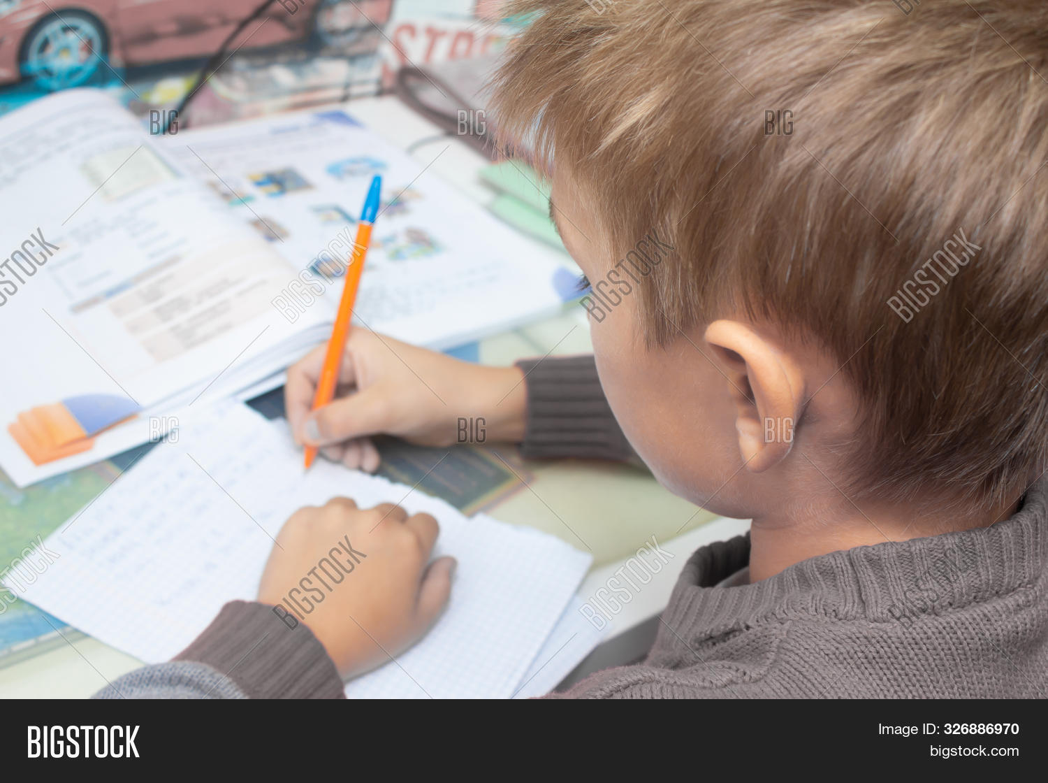 background,board,boy,chalk,chalkboard,child,children,class,closeup,cute,desk,education,elementary,english,essay,first,hand,handwriting,homework,isolated,kid,knowledge,language,learn,letter,note,notebook,one,paper,pen,pencil,person,preschool,primary,school,schoolboy,sitting,skills,smiling,space,spelling,student,study,studying,test,white,writing,young,youth