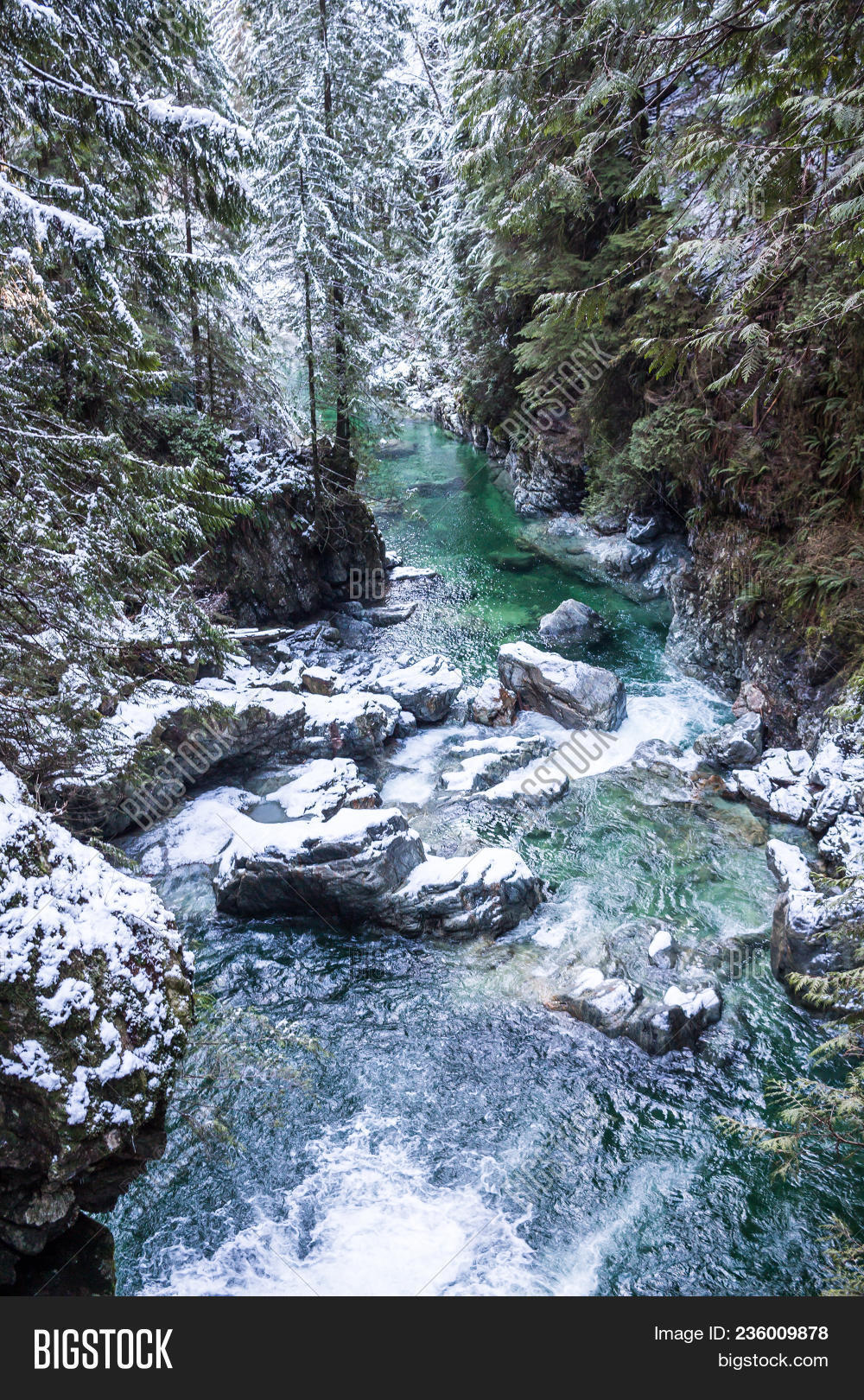 beauty,bolder,boulders,branches,british,canada,cascade,cold,columbia,creek,fall,flow,flowing,forest,green,ice,landscape,lynn,mountain,natural,nature,park,river,rock,rural,rustic,season,shallow,snow,snowy,stone,stream,summer,travel,tree,treetops,valley,vancouver,water,waterfall,winter