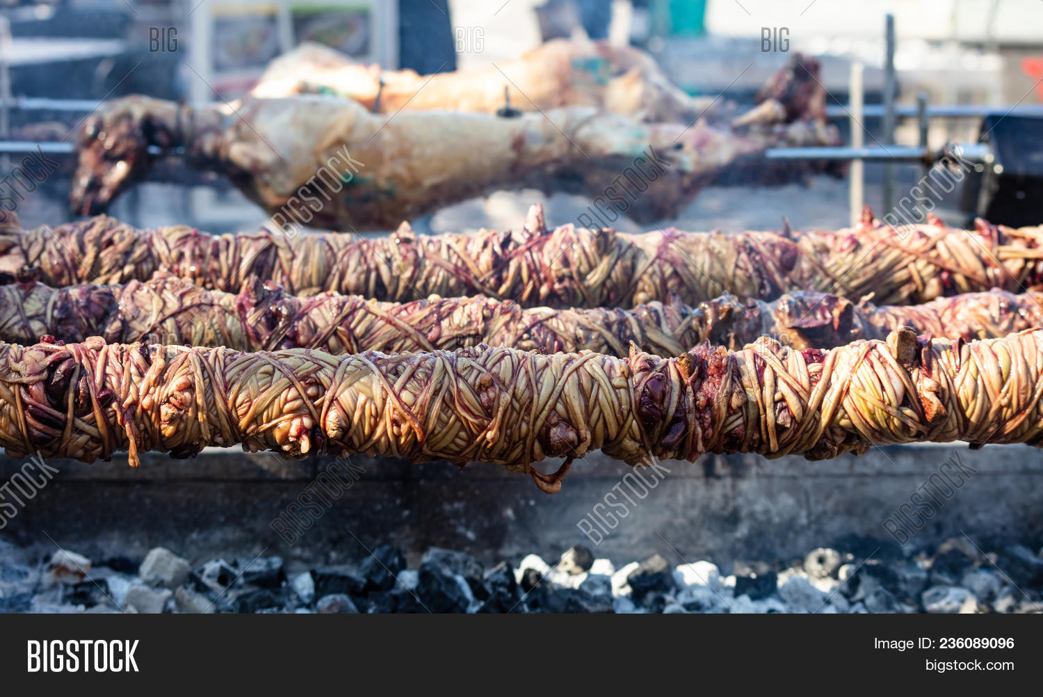 athens,background,barbecue,bbq,bowels,celebration,charcoals,chopped,closeup,coals,cooking,cuisine,easter,festival,fire,food,greece,greek,grill,hot,intestine,kokorec,kokorech,kokoretsi,lamb,meat,monastiraki,offal,outdoors,preparation,raw,restaurant,roasted,roasting,rolls,sheep,skewers,snack,spice,spit,strapped,street,tradition,traditional,turkey,turkish,turning,twisted,whole