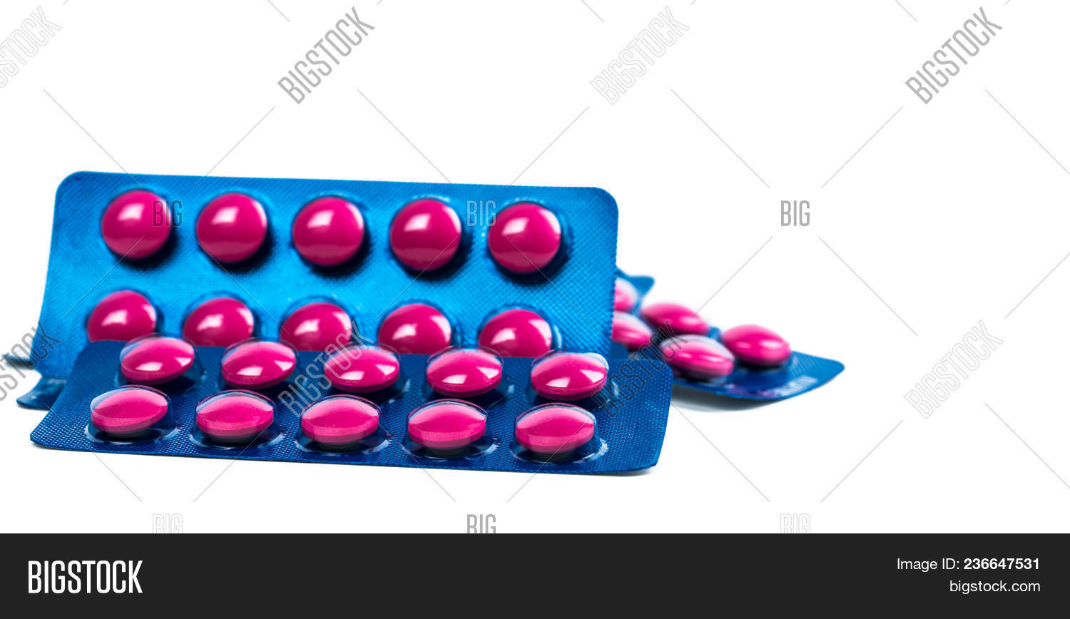 Ibuprofen In Pink Tablet Pills Pack In Blue Blister Pack Isolated On