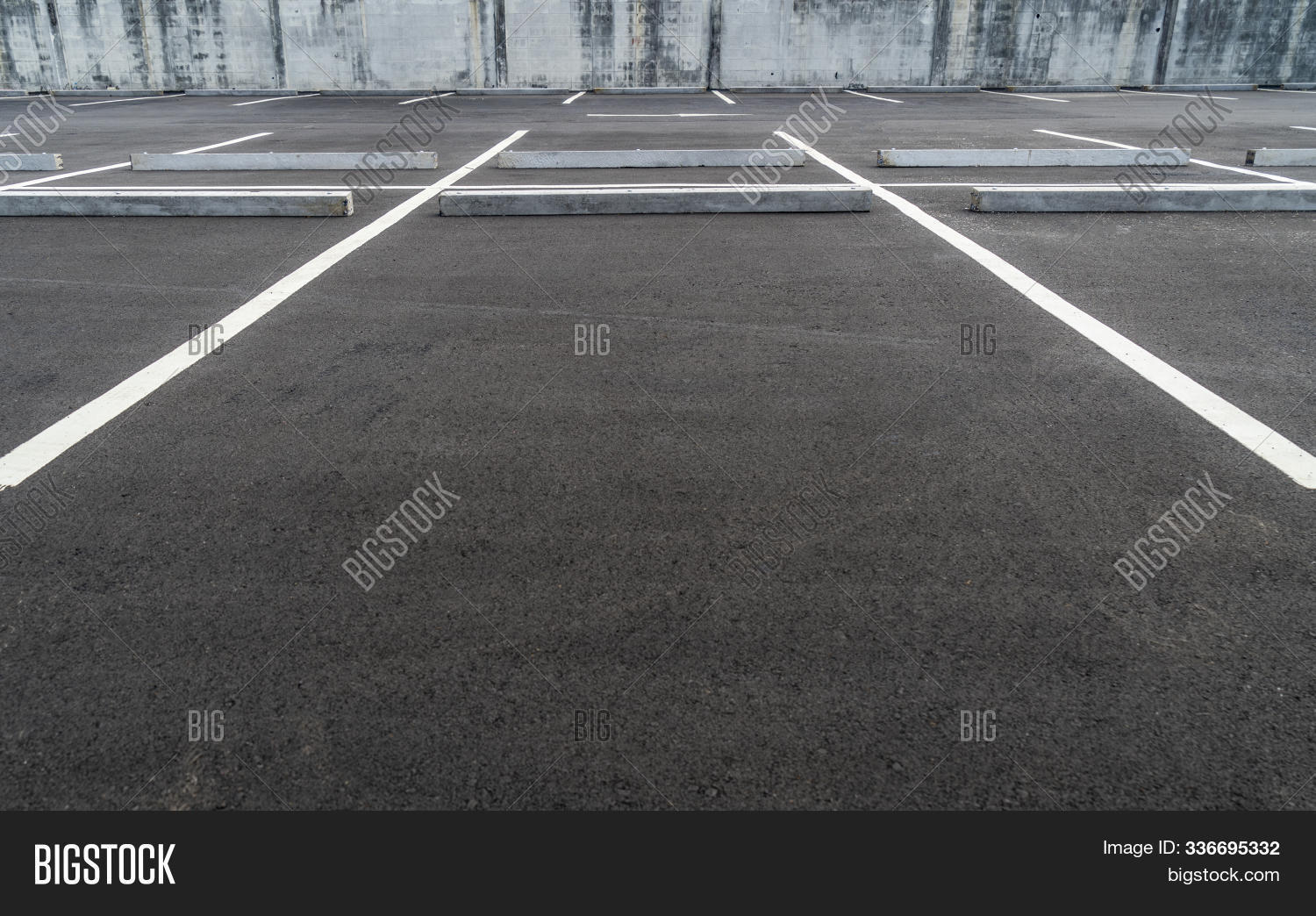 abstract,angle,asphalt,auto,automobile,background,big,bitumen,black,blacktop,car,carpark,city,closeup,concrete,convenient,day,divide,empty,gray,ground,lane,line,lot,low,mark,nobody,outdoor,outside,paint,park,parking,pattern,pavement,perspective,public,road,slot,space,stopper,street,stripes,traffic,transport,transportation,urban,view,wall,white