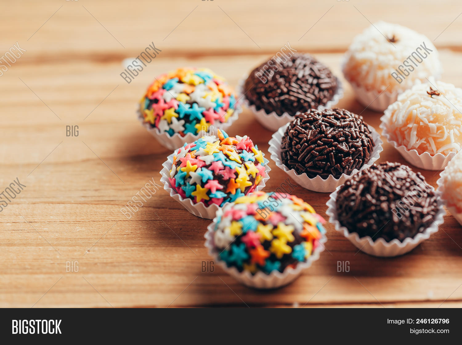 above,background,bakery,ball,beijinho,birthday,brazil,brazilian,brigadier,candy,children,clove,coconut,condensed,condensedmilk,cuisine,culinary,delicious,depth,dessert,eat,field,finger,food,gastronomy,gourmet,handmade,homemade,isolated,kids,kiss,little,macro,milk,nobody,one,overhead,party,ready,shallow,single,studio,sweet,tasty,temptation,traditional,truffle,typical,white,wood