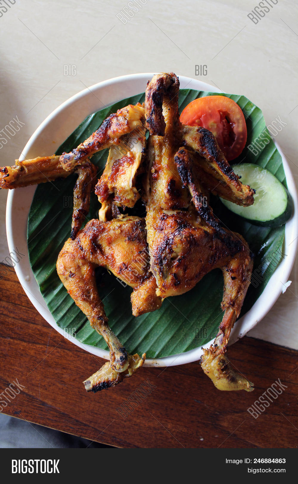 Balinese,Indonesian,Javanese,ayam,bakar,barbecued,belacan,burned,charcoal,chicken,classic,culinary,dish,food,grilled,kecap,ketchup,local,manis,marinated,popular,restaurant,roasted,sauce,soy,spices,sweet,tradition,traditional,warung