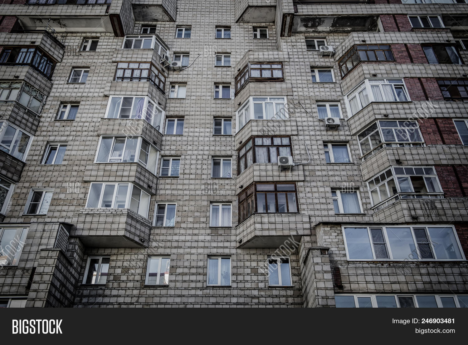 1980s,apartment,architecture,asia,background,bldg,block,building,central,city,concrete,conditioner,construction,dark,design,east,edifice,estate,exterior,facade,gray,grey,grunge,high-rise,home,house,kaz,kazahstan,kazakhstan,kz,modern,multistorey,multistory,old,oskemen,outdoor,people,reds,residential,sovdep,soviet,street,structure,style,town,urban,ussr,ust-kamenogorsk,windows