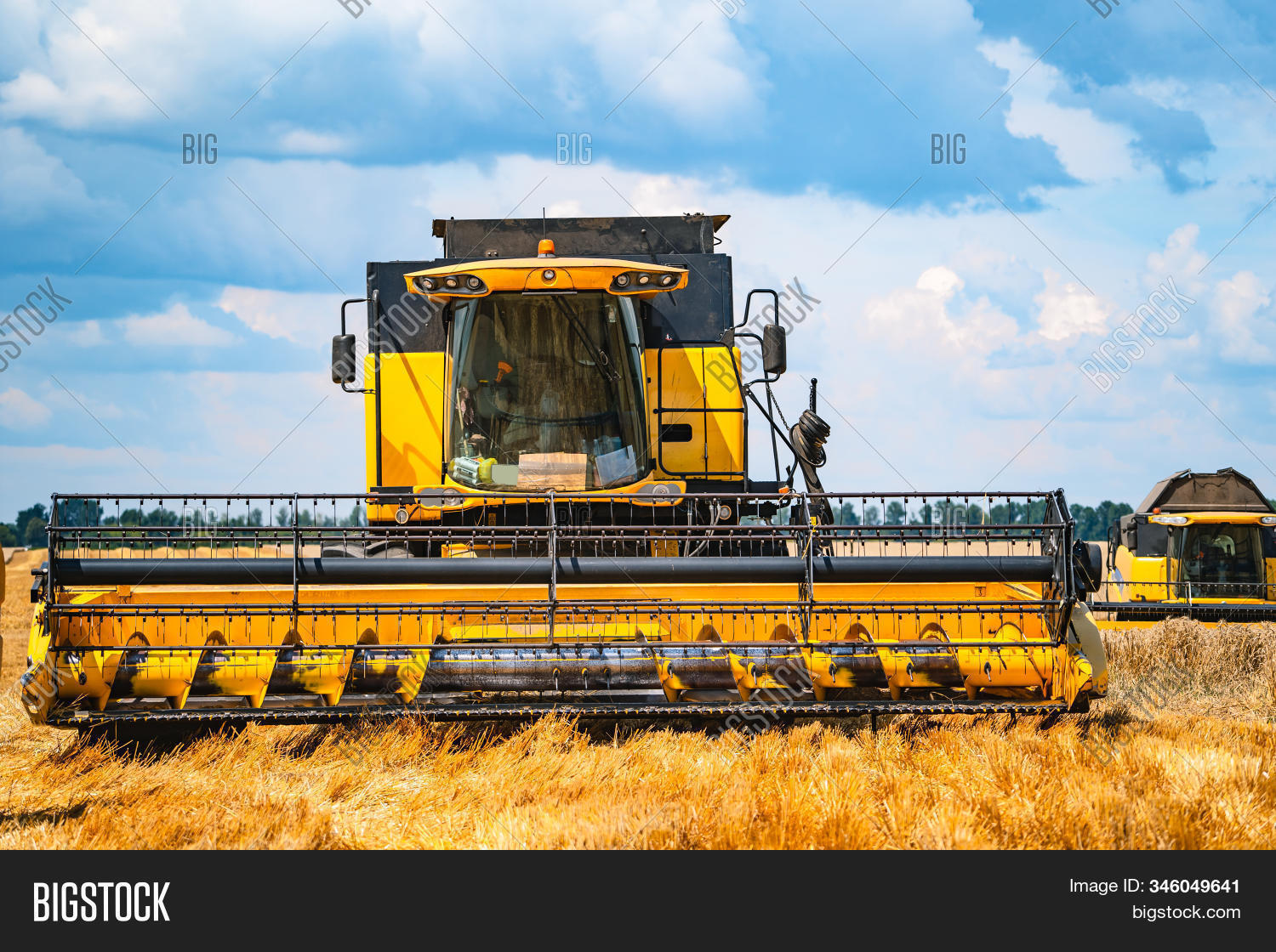 agriculture,harvester,field,wheat,machine,harvesting,combine,harvest,ripe,golden,working,rural,farm,agricultural,reaping,farming,dust,rye,tractor,straw,industry,grain,nature,barley,growth,horizon,land,rows,stem,swath,corn,grow,application,campaign,tanker-type,wheeled,yellow,countryside,beautiful,pickup,beauty,winning,carrier,growing,day,yield,header,landscape,summer