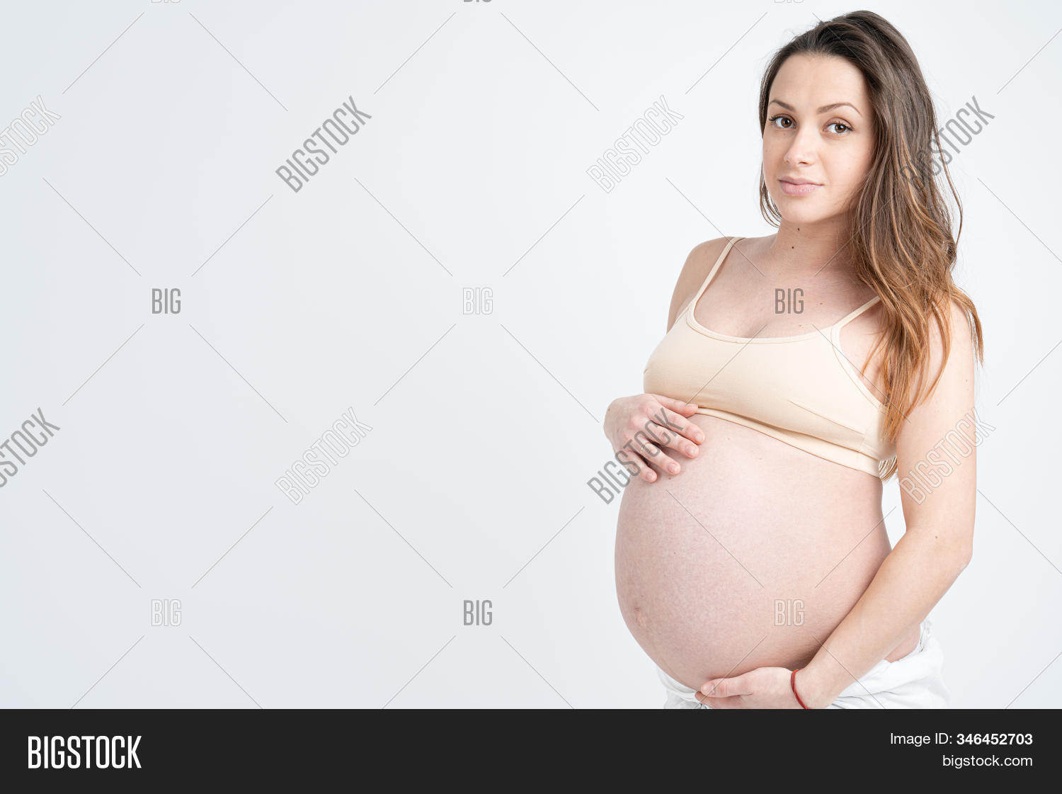 background,family,woman,baby,fashion,hand,love,person,girl,pregnant,expecting,maternity,mother,motherhood,studio,waiting,female,beauty,happy,attractive,beautiful,belly,adult,portrait,smile,isolated,pregnancy,stomach,pretty,touch,positive,white,young,parent,holding,birth,parenting,tummy,lovely,care,childbirth,cute,elegant,expectant,body,anticipation,abdomen,human,life,awaiting