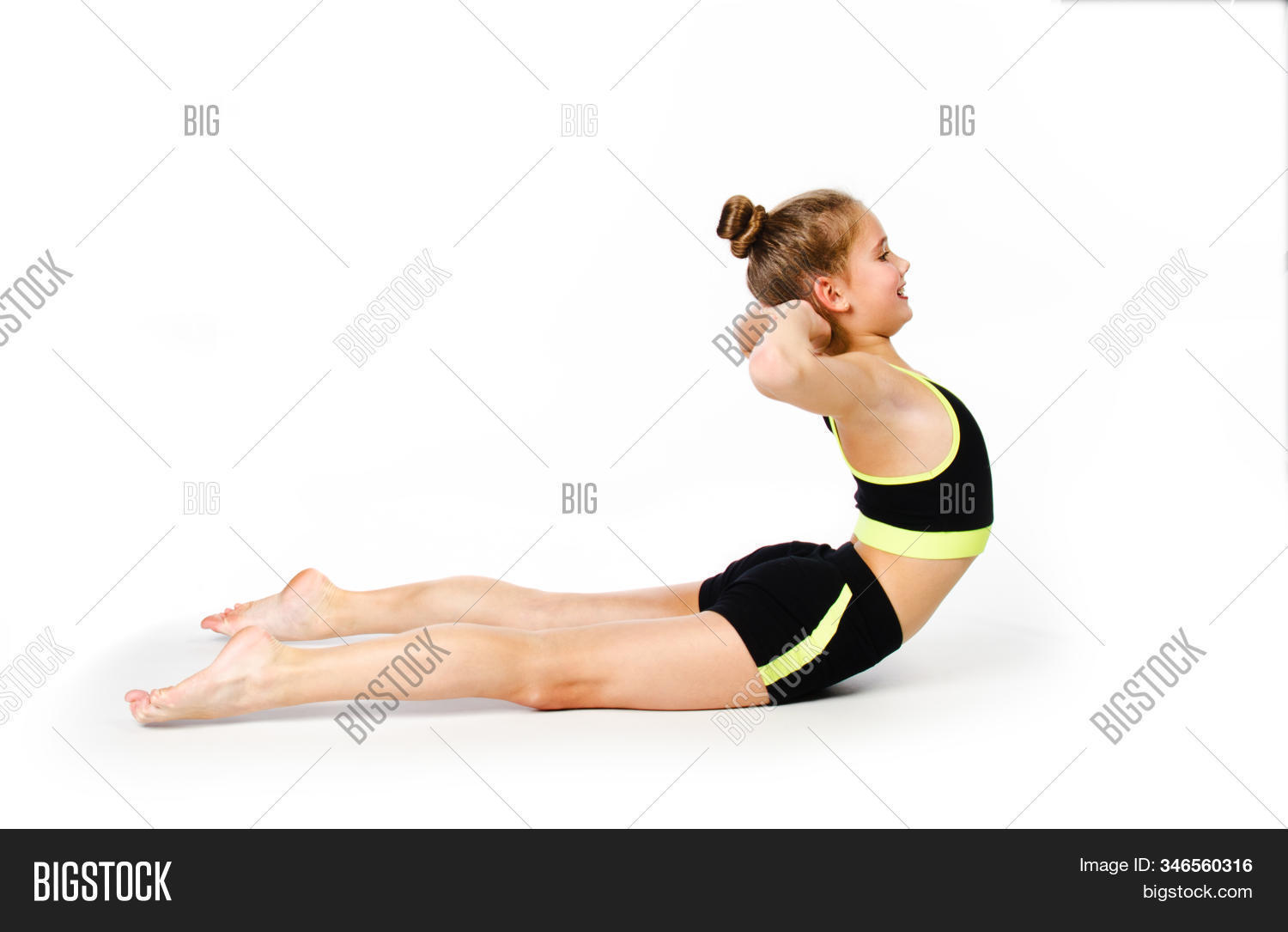 gymnast,fitness,sport,girl,child,flexible,acrobatic,exercise,athlete,body,active,activity,beautiful,caucasian,childhood,black,suit,female,gym,gymnastic,health,healthy,lifestyle,posing,schoolgirl,small,smile,sporty,stretch,stretching,training,yoga,young,youth,kid,little,cute,isolated,white,background