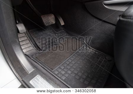 Dirty Car Floor Mats Of Gray Carpet With Gas Pedals And Brakes In The Workshop For The Detailing Veh