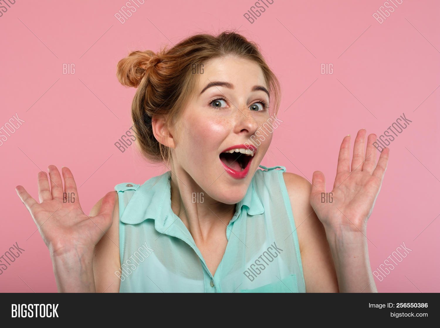 adult,amazed,amazement,background,caucasian,copy,copyspace,covering,dark,dumbfounded,emotion,expression,expressive,facial,feelings,free,girl,hand,mood,mouth,omg,open,people,person,personality,pink,portrait,reaction,shock,space,unbelievable,woman,young