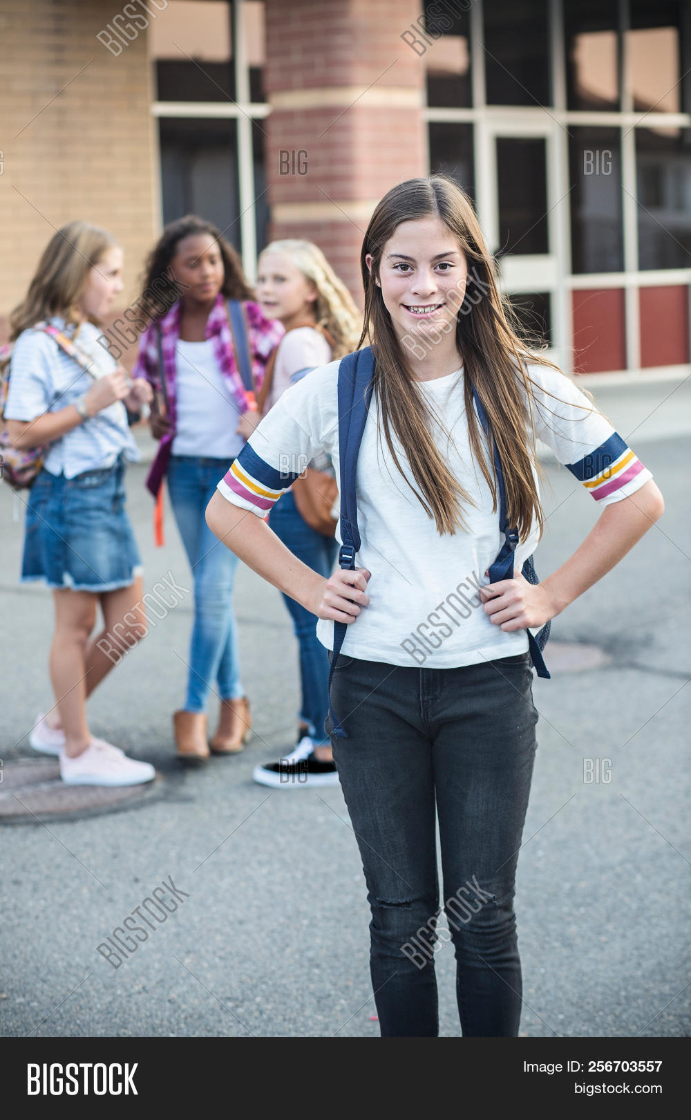 african american,after school,backpack,building,campus,classmates,clique,confidence,cute,diversity,education,ethnicity,face,focus on foreground,friends,friendship,girl,girls,group,hanging out,happy,hispanic,junior,junior high school,learning,looking,middle,multi-ethnic group,outside,playground,portrait,preadolescent,pretty,public,school,selective focus,smiling,standing,strong,student,students,teen,teenager,tween,vertical,young